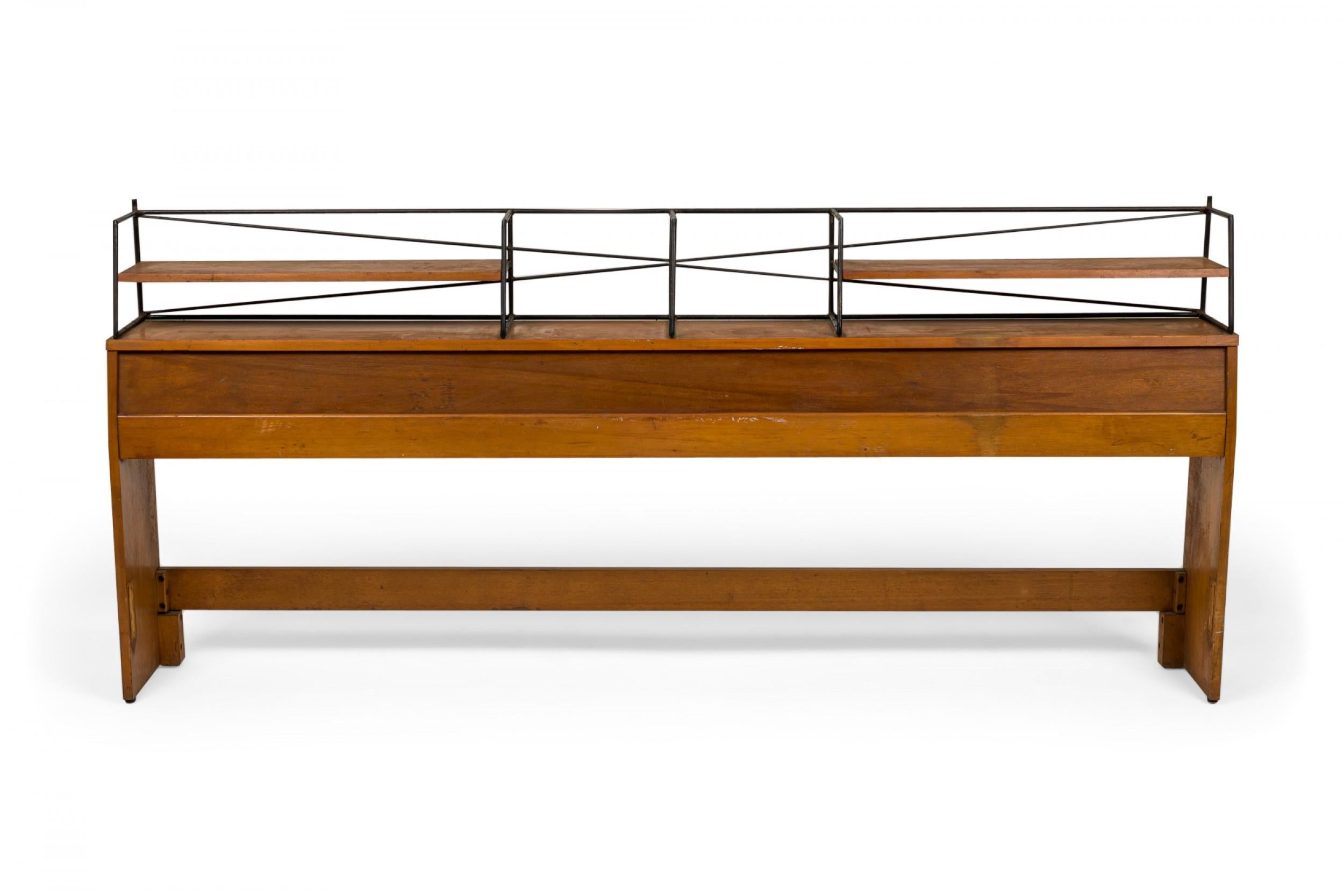 American Mid-Century king-size Planner Group design walnut headboard with an upper shelf section with an iron structure. (PAUL MCCOBB FOR WINCHENDON FURNITURE CO)