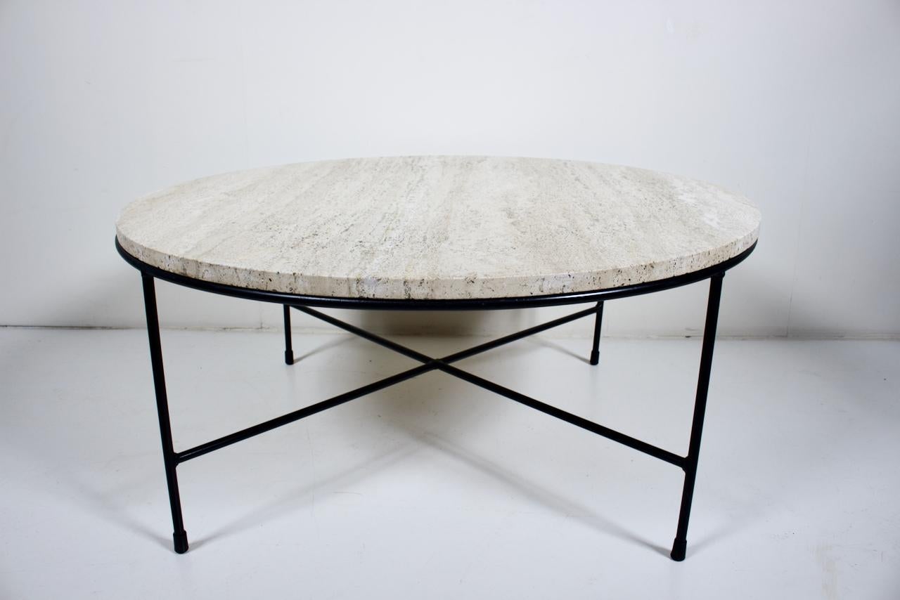 Paul McCobb Black Enameled Iron Rod Coffee Table Base & Travertine top. Featuring a supported x brace Black enameled Wrought Iron framework, capped feet, with separate round 36