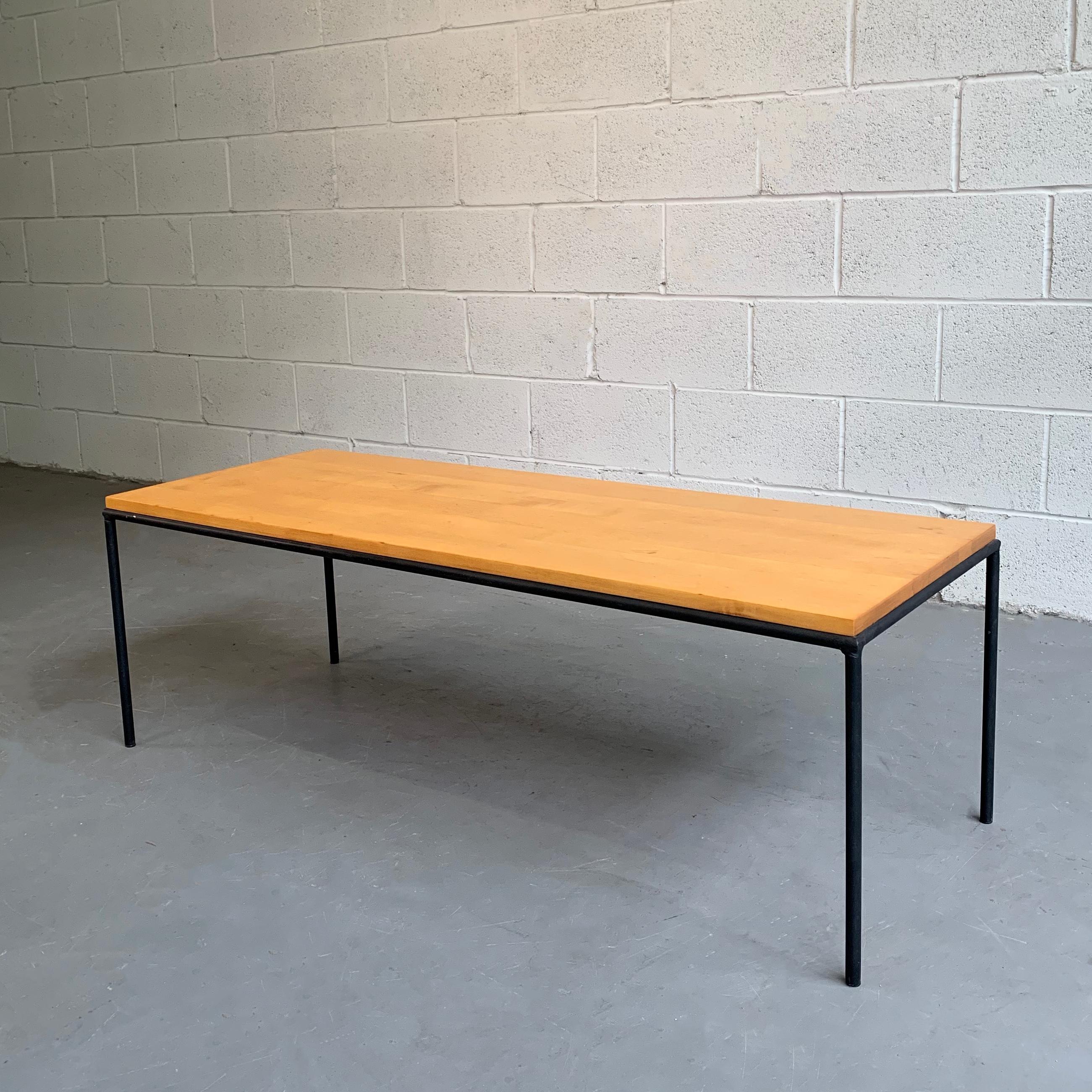 Mid-Century Modern, coffee table by Paul McCobb for Winchendon features a minimal wrought iron frame with maple top.