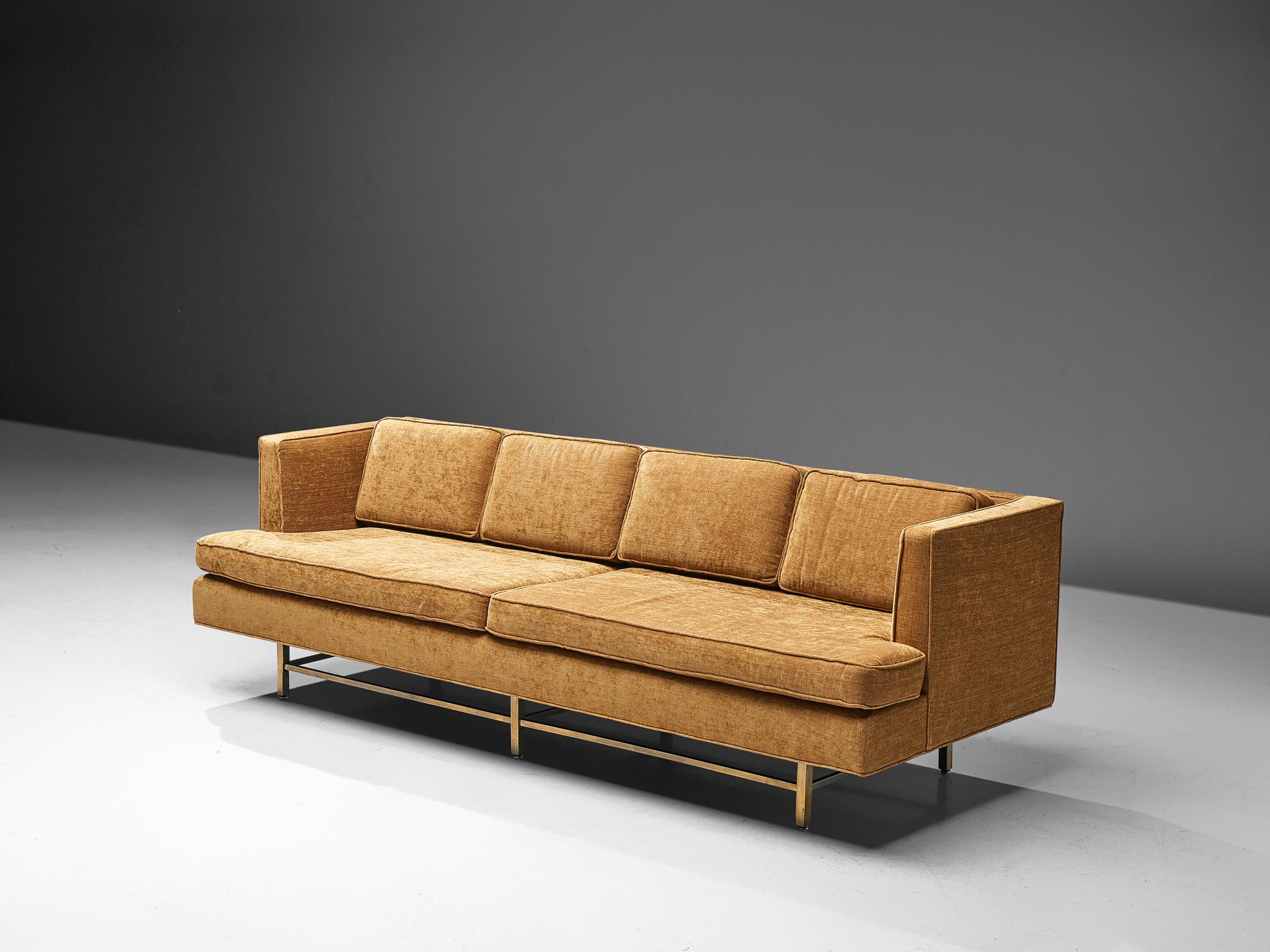 Paul McCobb for Directional, four-seat sofa, brass and fabric, United States, circa 1958.

A sofa by Paul McCobb for Directional with a brass base. The model is simple and elegant, as it bears features of classic design combined with minimalist,
