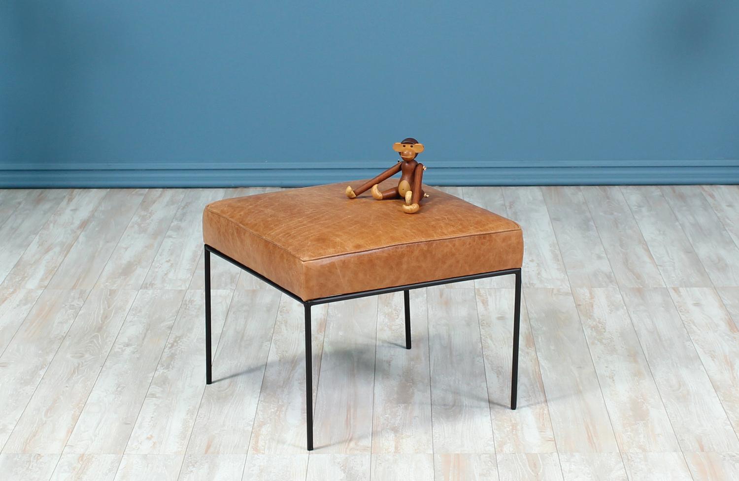 A lovely stool designed by Paul McCobb for Planner Group in the United States circa 1950’s. This clean design features a newly upholstered seat in new full-grain tan leather and an iron base. The interior has been replaced with comfortable