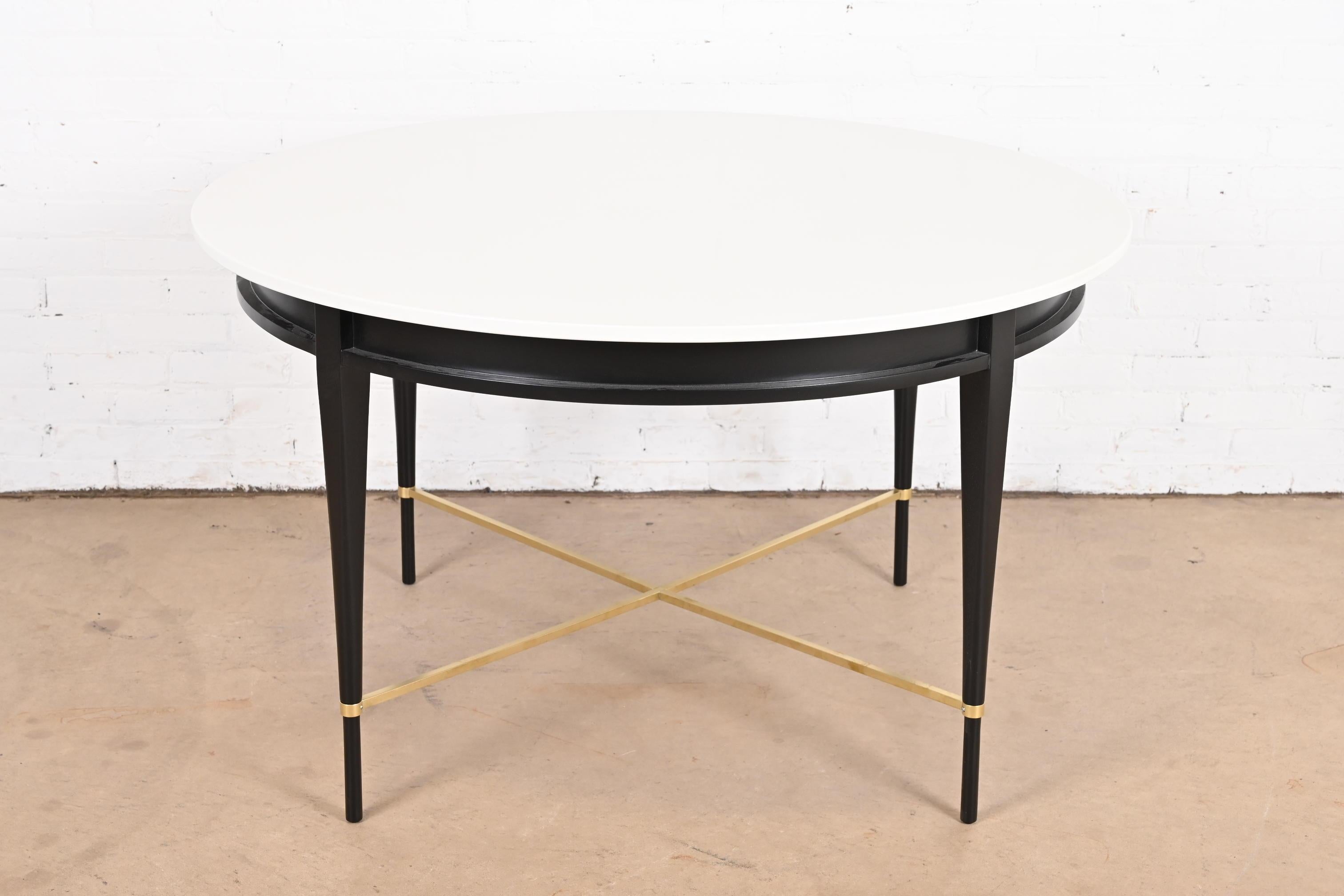An exceptional Mid-Century Modern round dining table, game table, or center table

By Paul McCobb for Directional and produced by Calvin Furniture, 