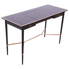 Coiffeuse à plateau relevable en laque noire et laiton de la collection Paul McCobb Irwin, revernie
