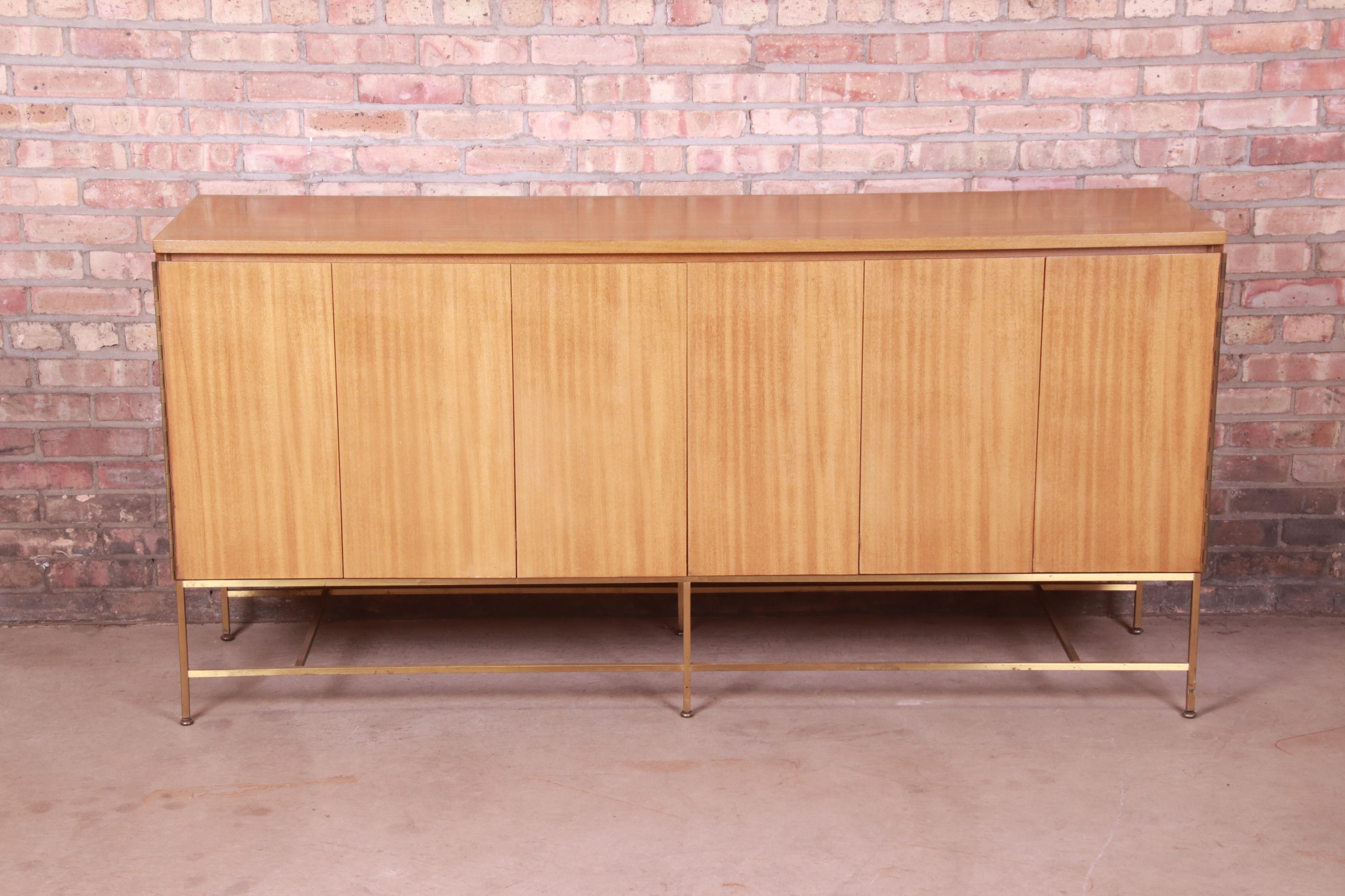 An exceptional Mid-Century Modern sideboard, credenza, or bar cabinet

By Paul McCobb for Directional and produced by Calvin Furniture, 