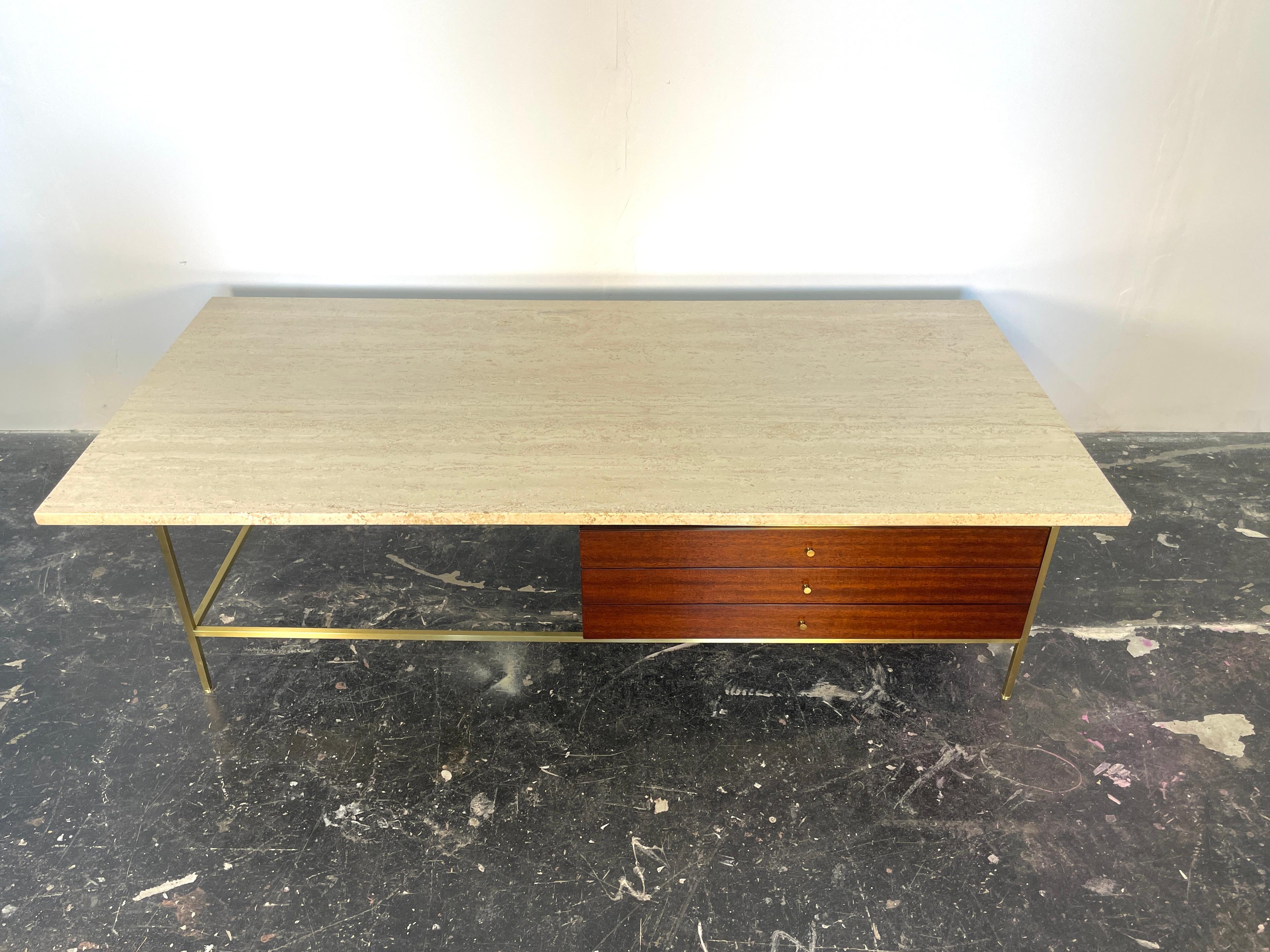 Mid Century Modern's star Paul McCobb Irwin Collection Brass and Travertine Coffee Table for Calvin Furniture

Original Paul McCobb walnut and brass plateau table model 8705-L with travertine marble top from the Irwin Collection by Calvin Furniture.