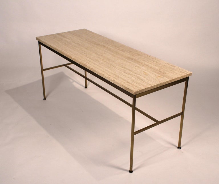 Console designed by Paul McCobb for Directional. Constructed of brass with travertine top. Excellent condition.
