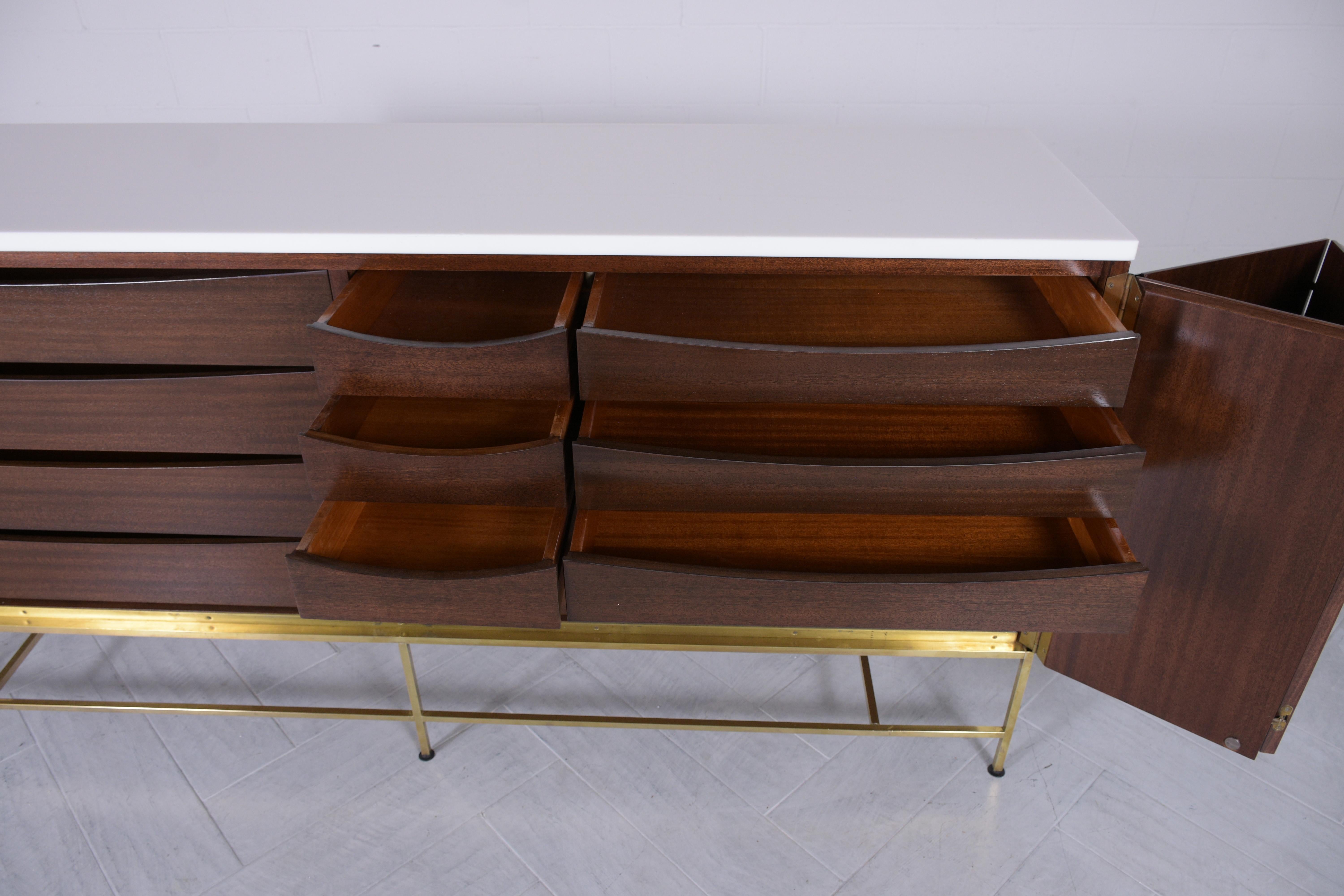 Vintage Paul McCobb Credenza: A Masterpiece of Mid-Century Modern Elegance In Good Condition For Sale In Los Angeles, CA