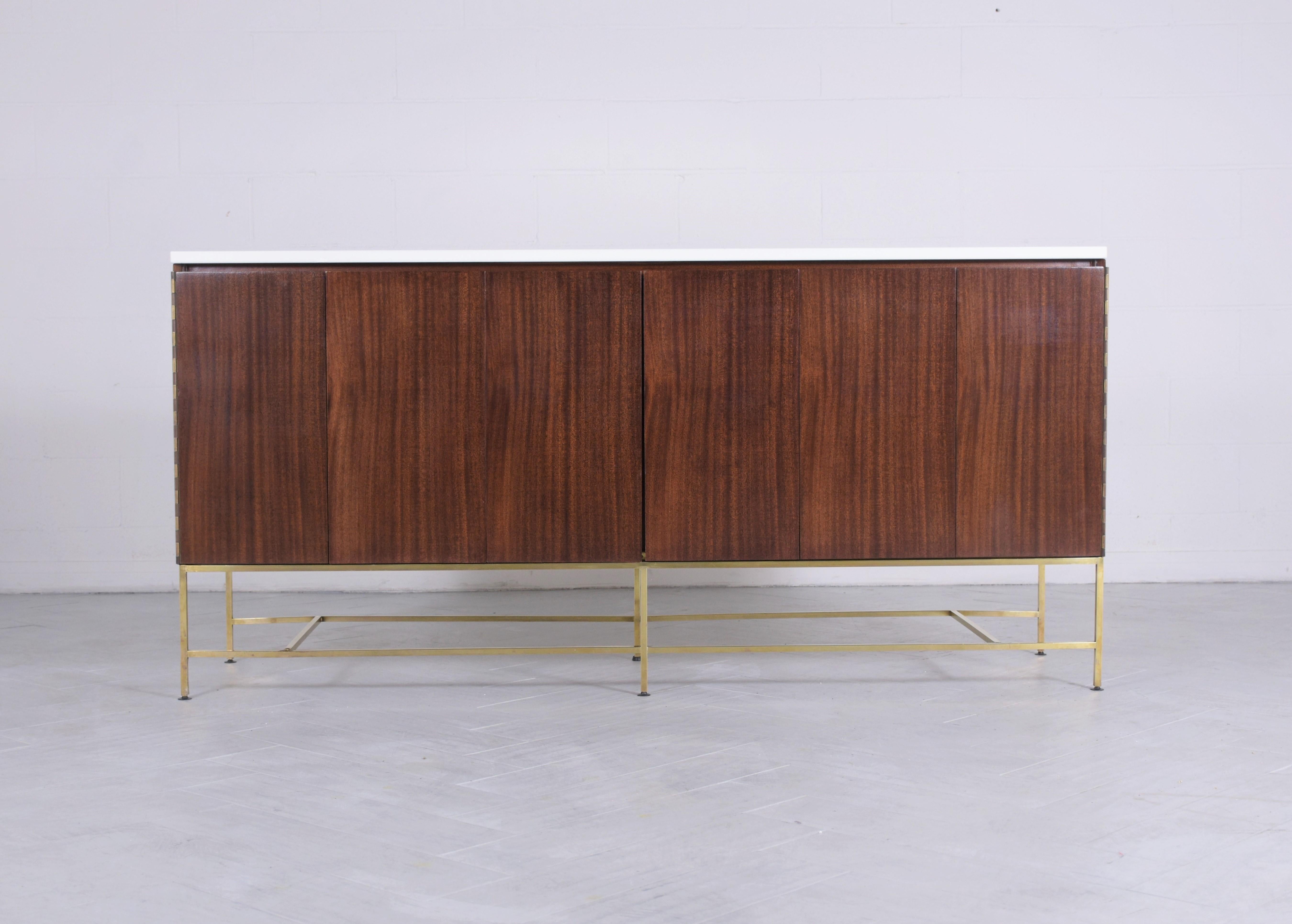 Step into the realm of mid-century modern elegance with our vintage Paul McCobb credenza from the iconic 