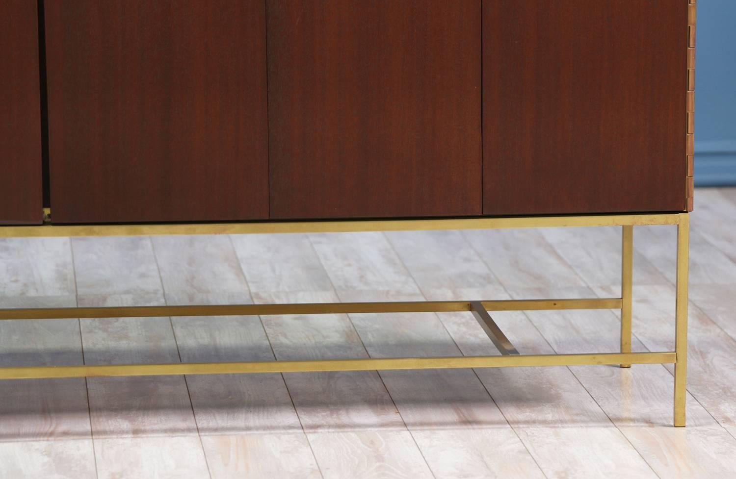 Mid-20th Century Paul McCobb “Irwin Collection” Credenza with Bi-Folding Doors and Travertine Top