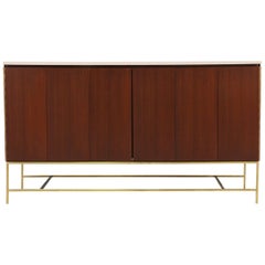 Paul McCobb “Irwin Collection” Credenza with Bi-Folding Doors and Travertine Top