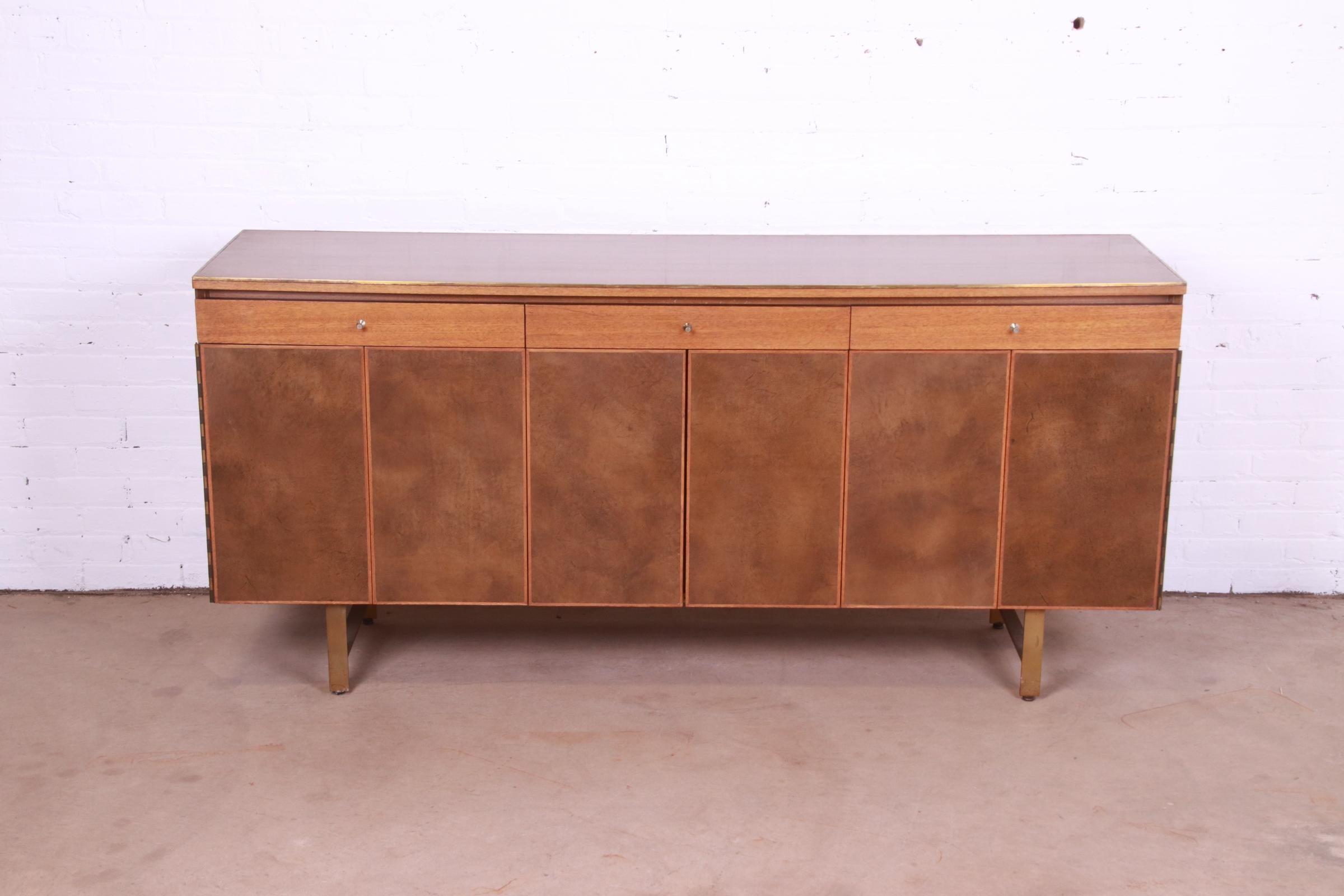 A rare and exceptional Mid-Century Modern sideboard, credenza, or bar cabinet

By Paul McCobb for Directional and produced by Calvin Furniture, 