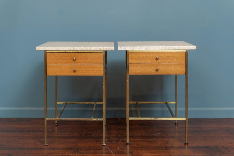 Paul McCobb design nightstands for his Irwin Collection by Calvin. Rare set in bleached mahogany with travertine tops on patinated brass frames, labeled.