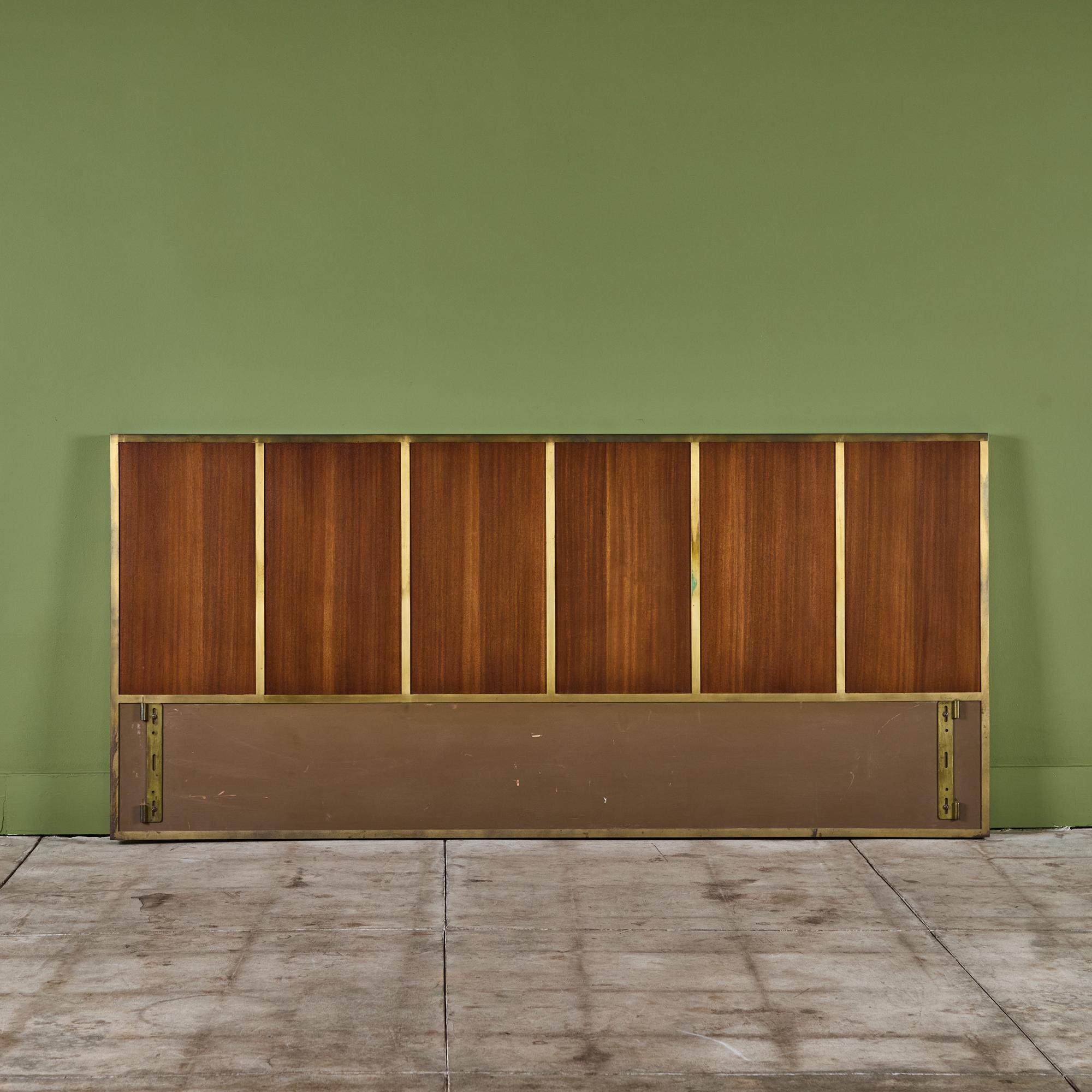 Headboard by Paul McCobb, for Calvin Furniture c.1960s, USA. This maple headboard features six panels encased in a brass frame and finished in a walnut stain. The maple panels have been fully refinished while the brass shows its natural patina