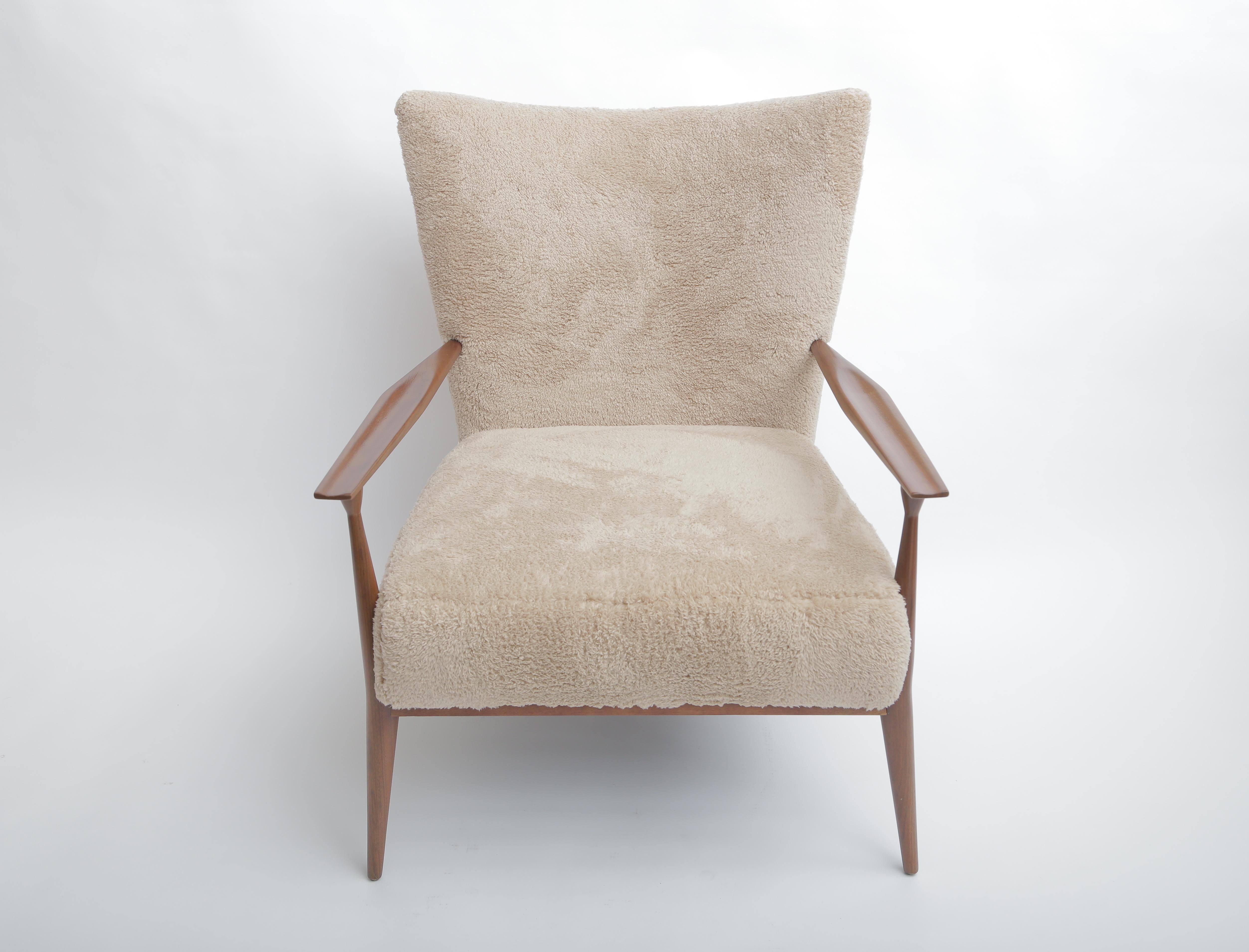 Manufactured by directional Furniture
Model #1321
Professionally reupholstered with faux fur.