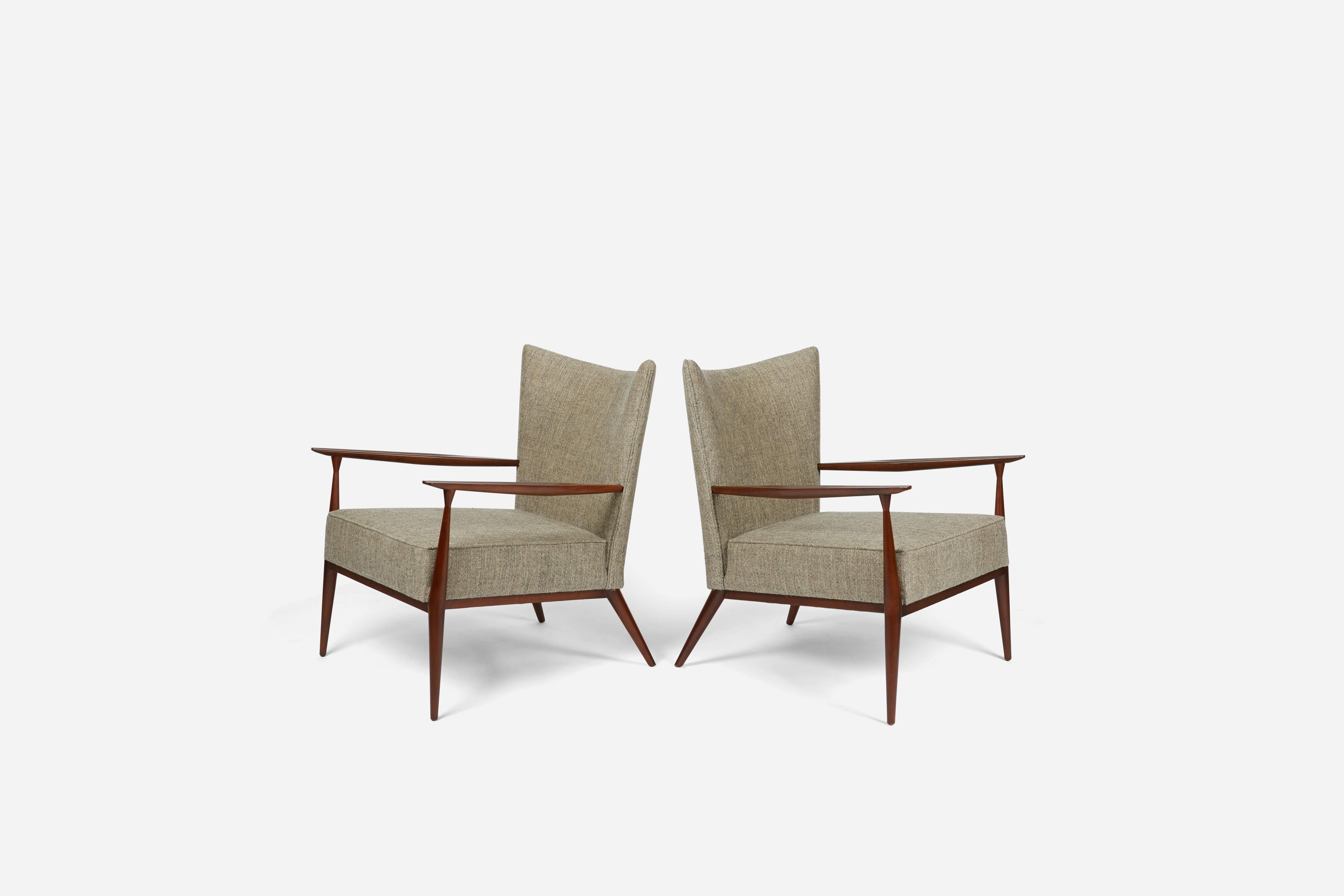 Handsome pair of Paul McCobb designed lounge chairs. Model #1328 for Directional Furniture. Fully restored. Refinished walnut frames, new upholstery.