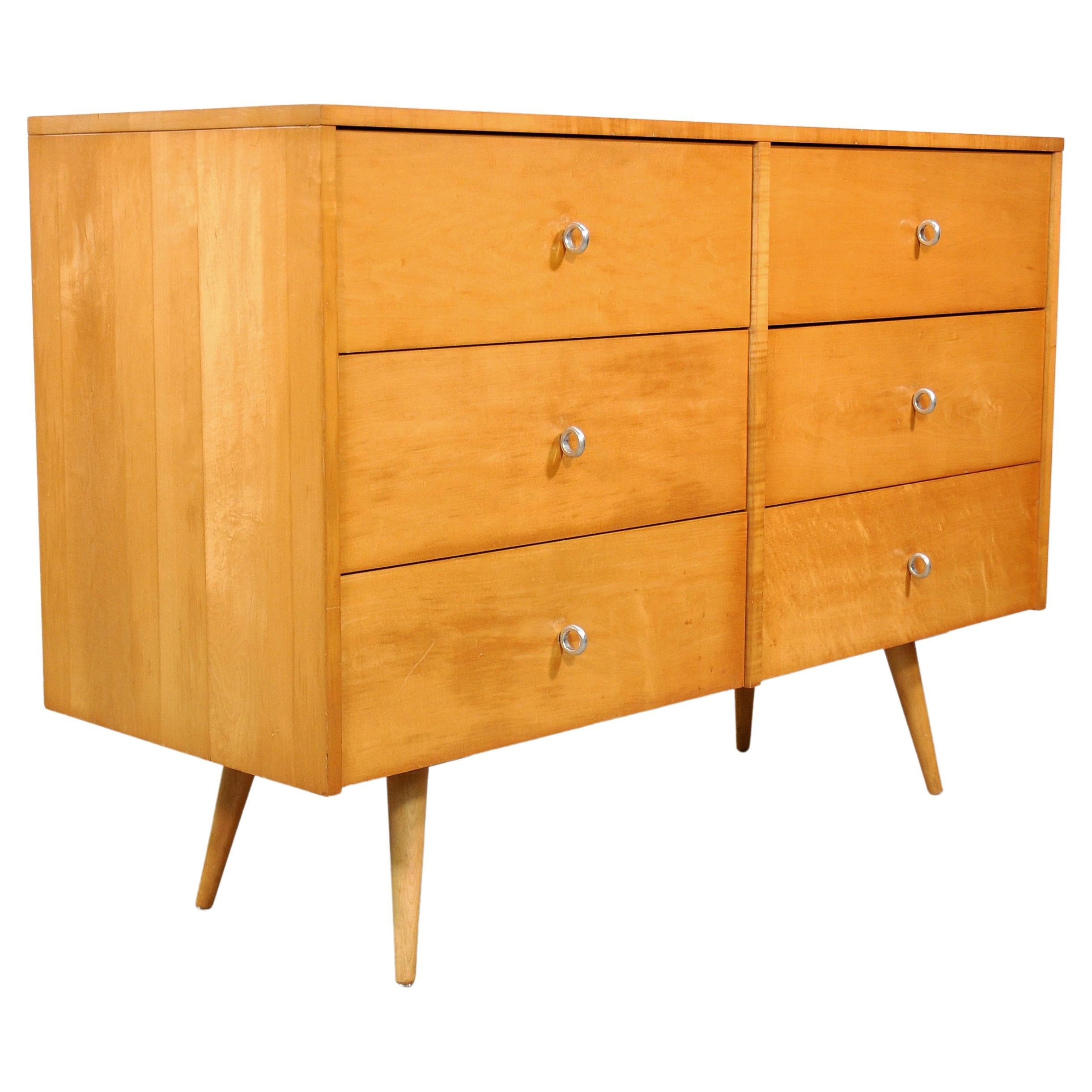 Mid-Century Modern vintage six-drawer dresser model no. 1509 designed by Paul McCobb for his modular Planner Group line made by Winchendon Furniture in the 1950s. The cabinet can be also used as a buffet or server credenza. Made of solid maple