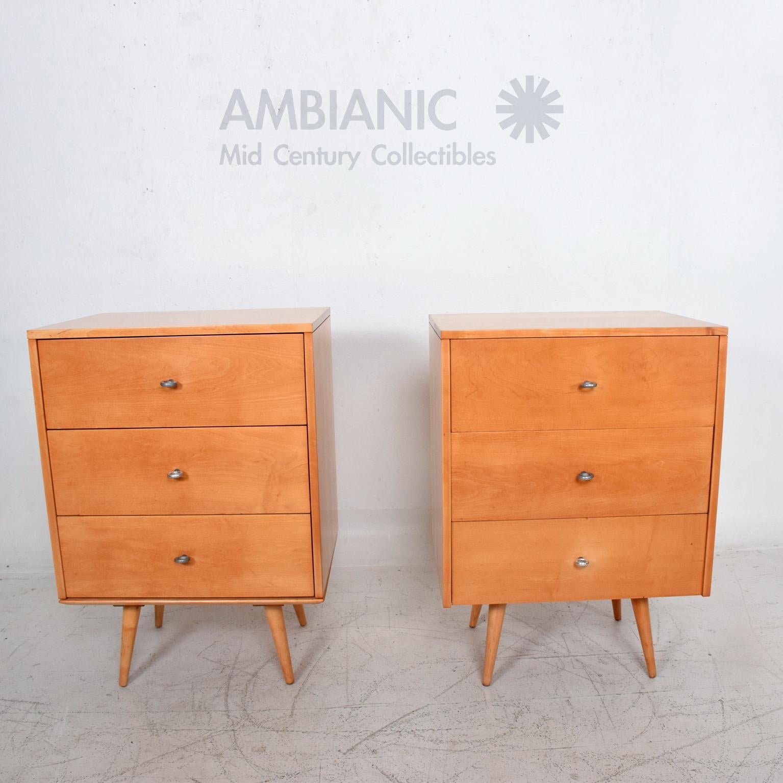 For your consideration: A pair of Paul McCobb lacquered maple wood single dressers. By Planner Group Design series, USA, 1950s. Winchendon Furniture.

Solid lacquered maple wood with McCobb Classic feature of aluminum silver ring pulls. All