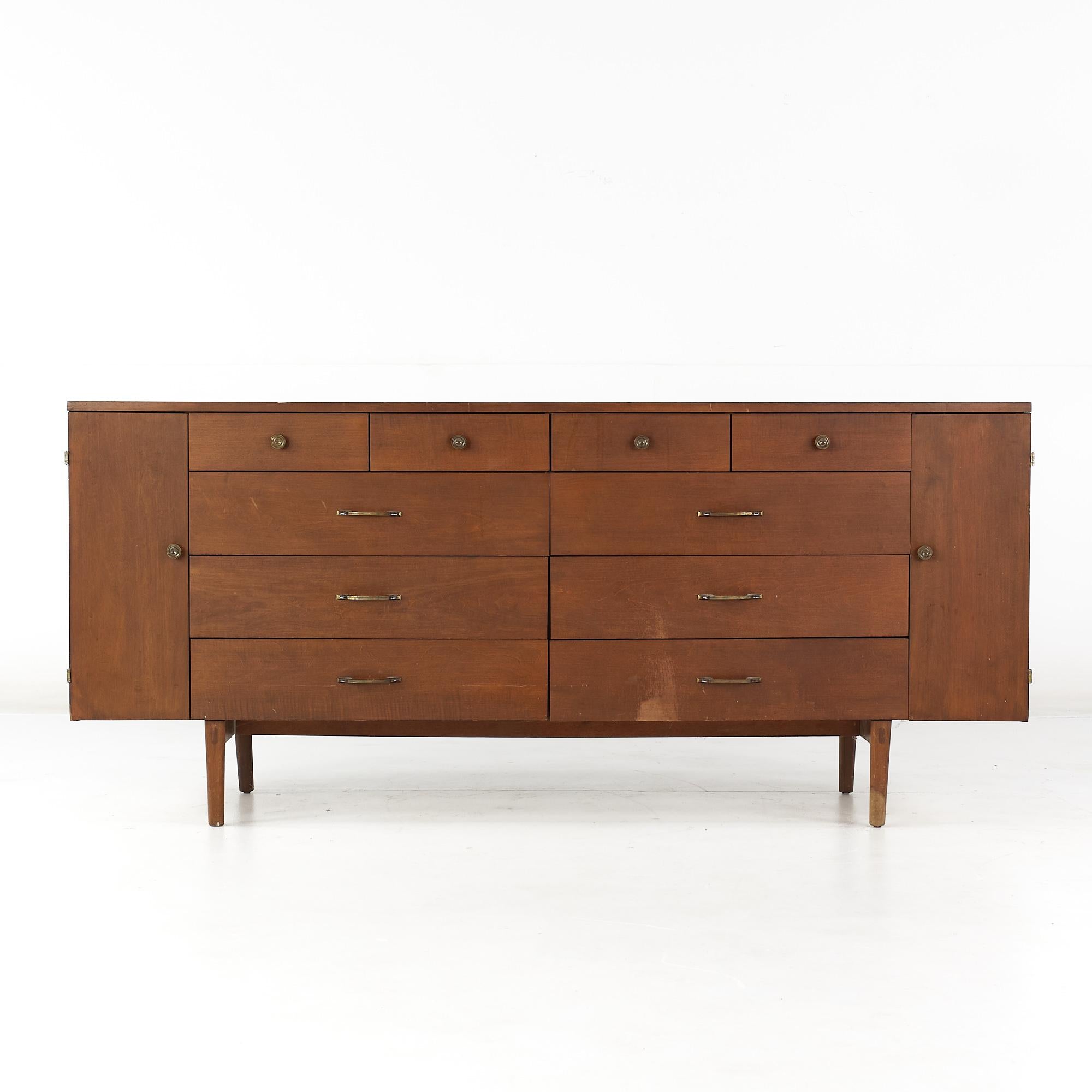 Paul McCobb mid-century 20 drawer lowboy dresser.

This lowboy dresser measures: 72 wide x 18.25 deep x 32 inches high.

All pieces of furniture can be had in what we call restored vintage condition. That means the piece is restored upon