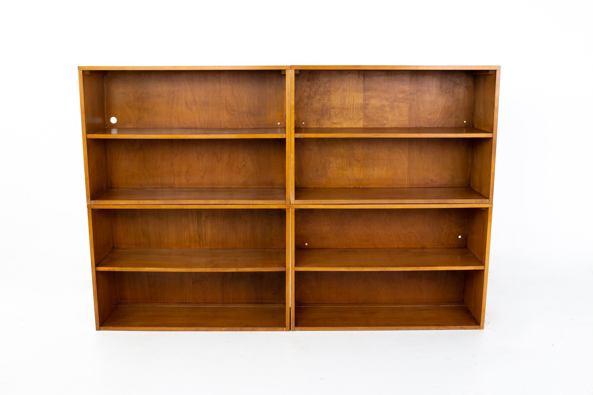 Paul McCobb mid century bookcase
Bookcase measures: 36 wide x 12.25 deep 24 inches high, total height of all 4 pieces is 96 inches

All pieces of furniture can be had in what we call restored vintage condition. That means the piece is restored
