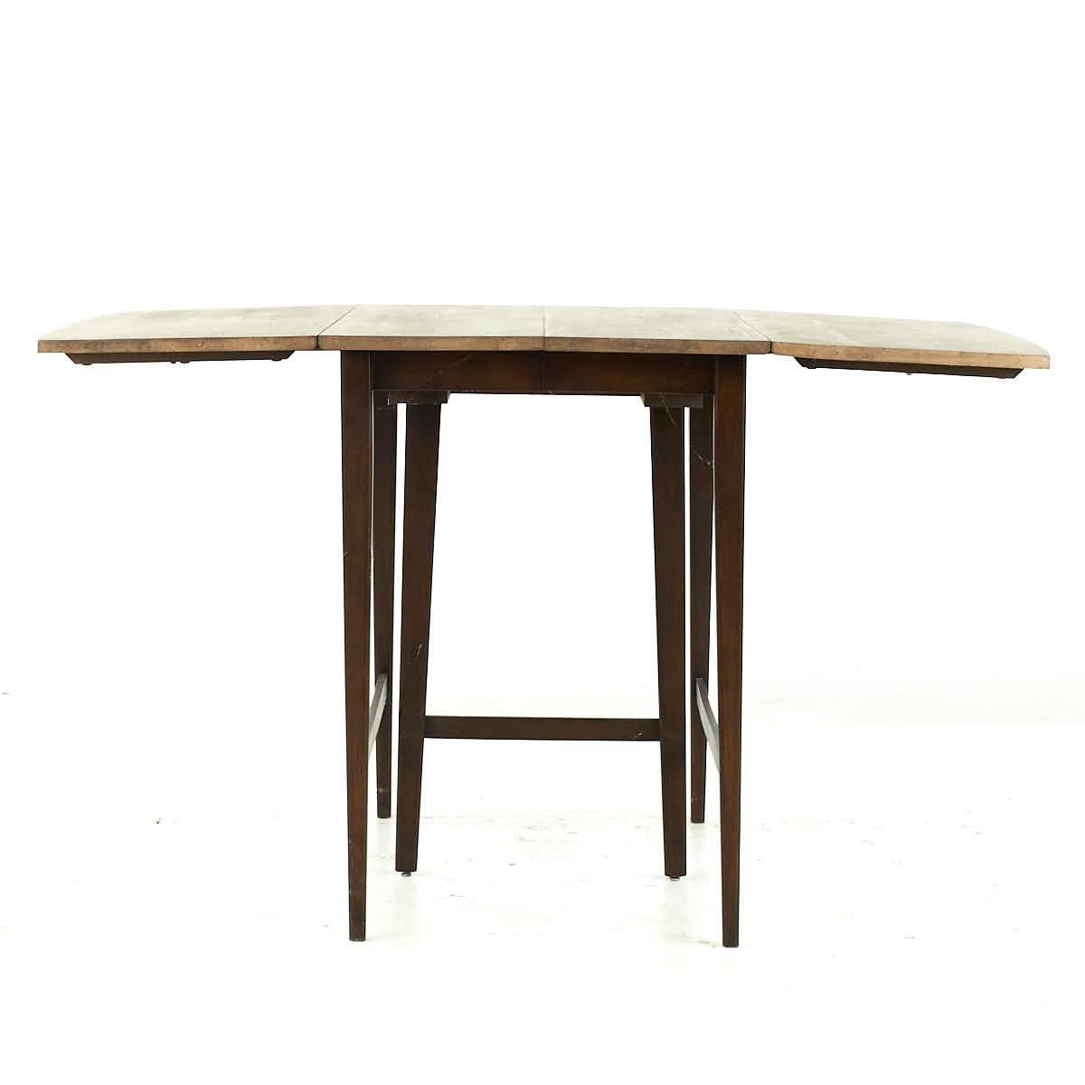 Wood Paul McCobb Mid Century Drop Leaf Dining Table with 3 Leaves For Sale