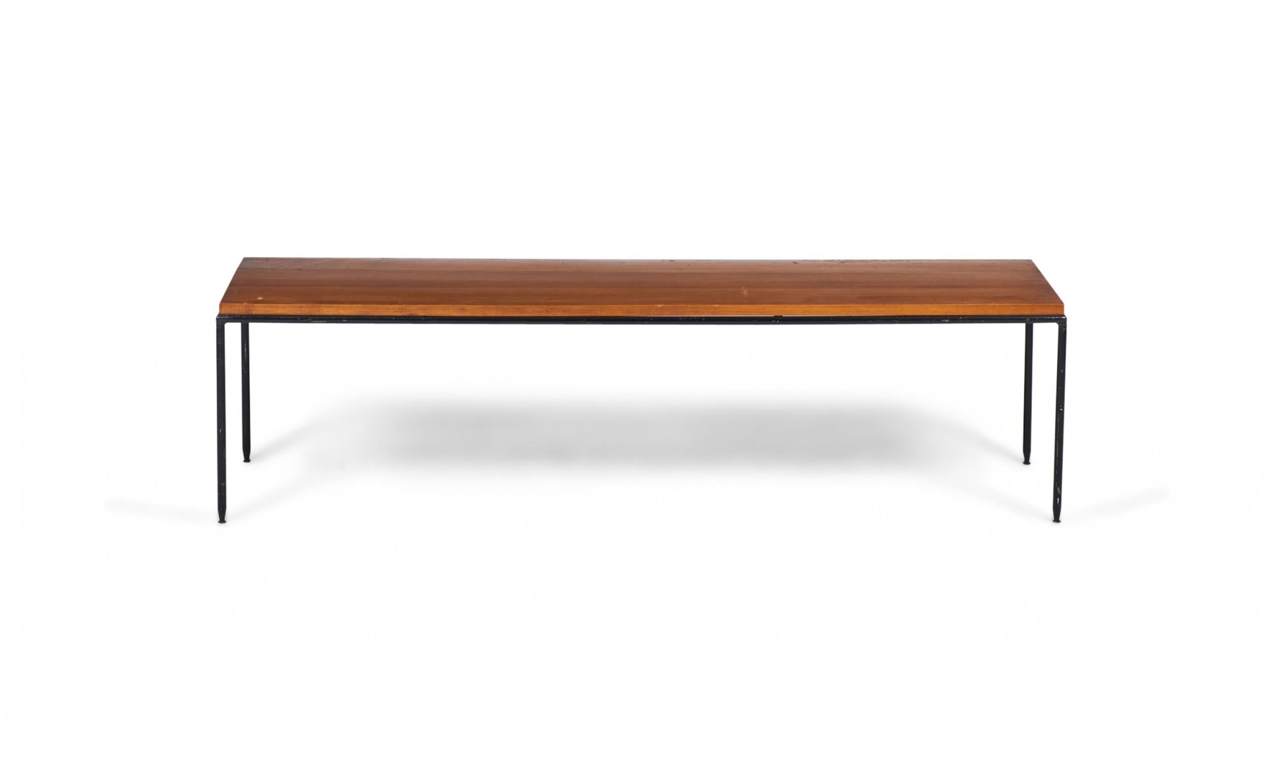 American Mid-Century rectangular coffee / cocktail table with a tobacco brown maple top resting on a wrought iron base. (PAUL MCCOBB)(Available in blond maple: DUF0084).
 
