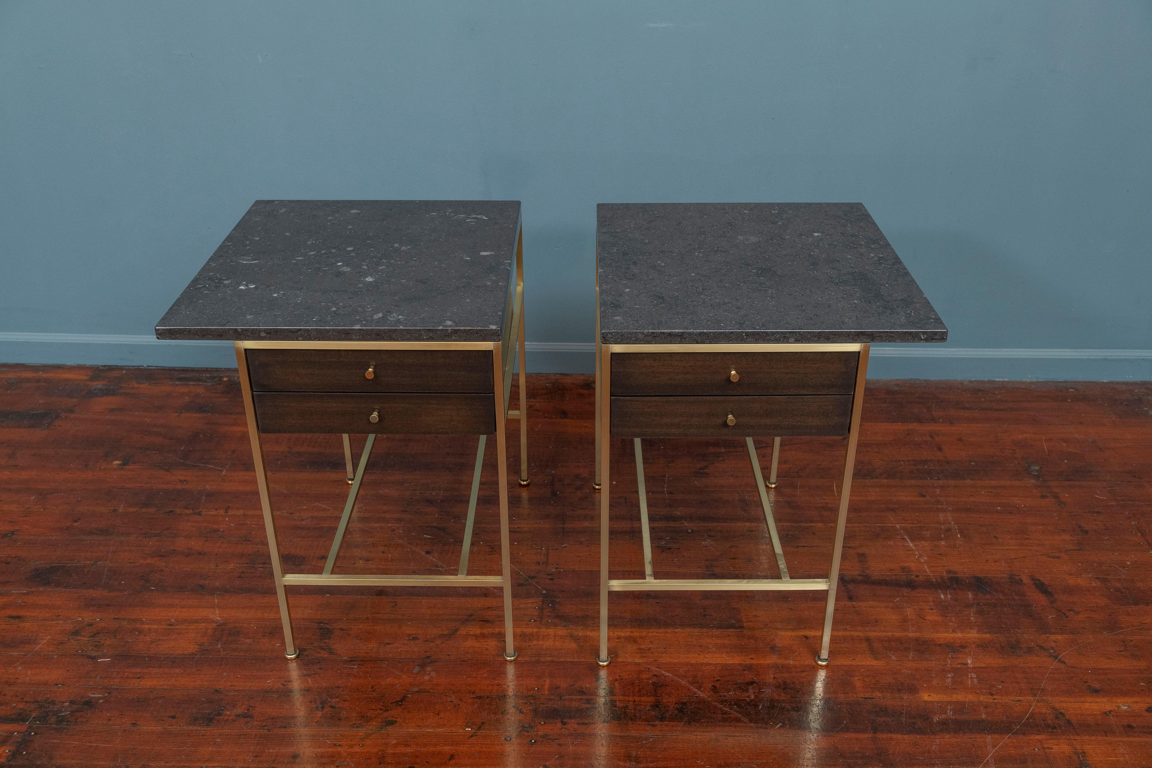 Paul McCobb design nightstands for Calvin Furniture, Model 8712. Newly refinished mahogany drawers, polished brass frames and honed Belgian black marble tops labeled.