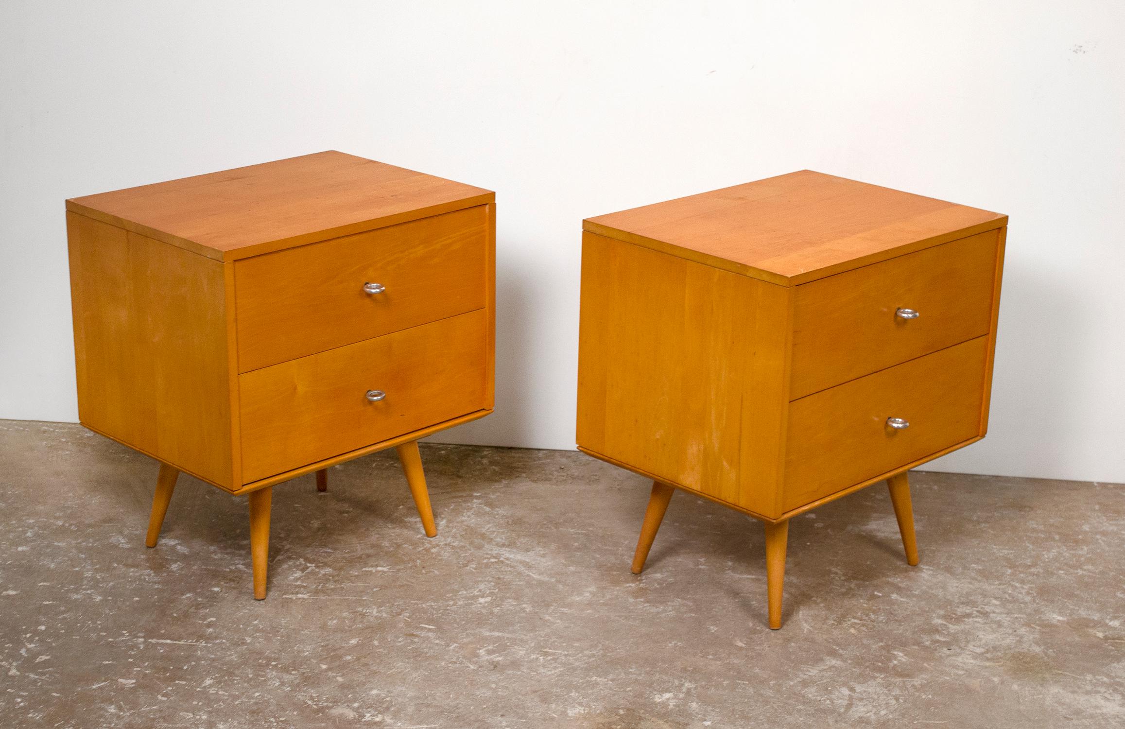 Stunning pair of solid maple Paul McCobb nightstands with original hardware. These cabinets are rock solid and were lightly refreshed. Ultra-modern and indestructible.