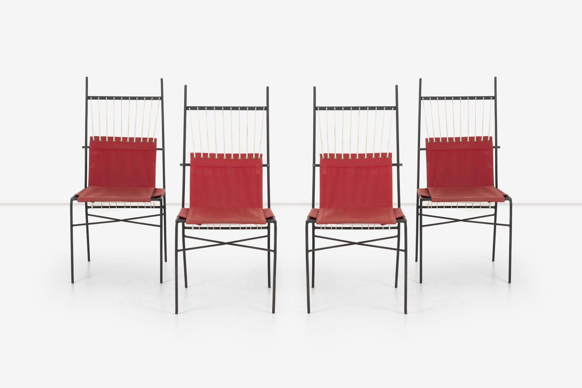 Juego de cuatro sillas de comedor de la colección Pavilion de Paul McCobb para Arbuck, juego raro, vintage
Puede utilizarse en interiores o exteriores
acero esmaltado, con lona roja y cuerda
39¾ alto × 18