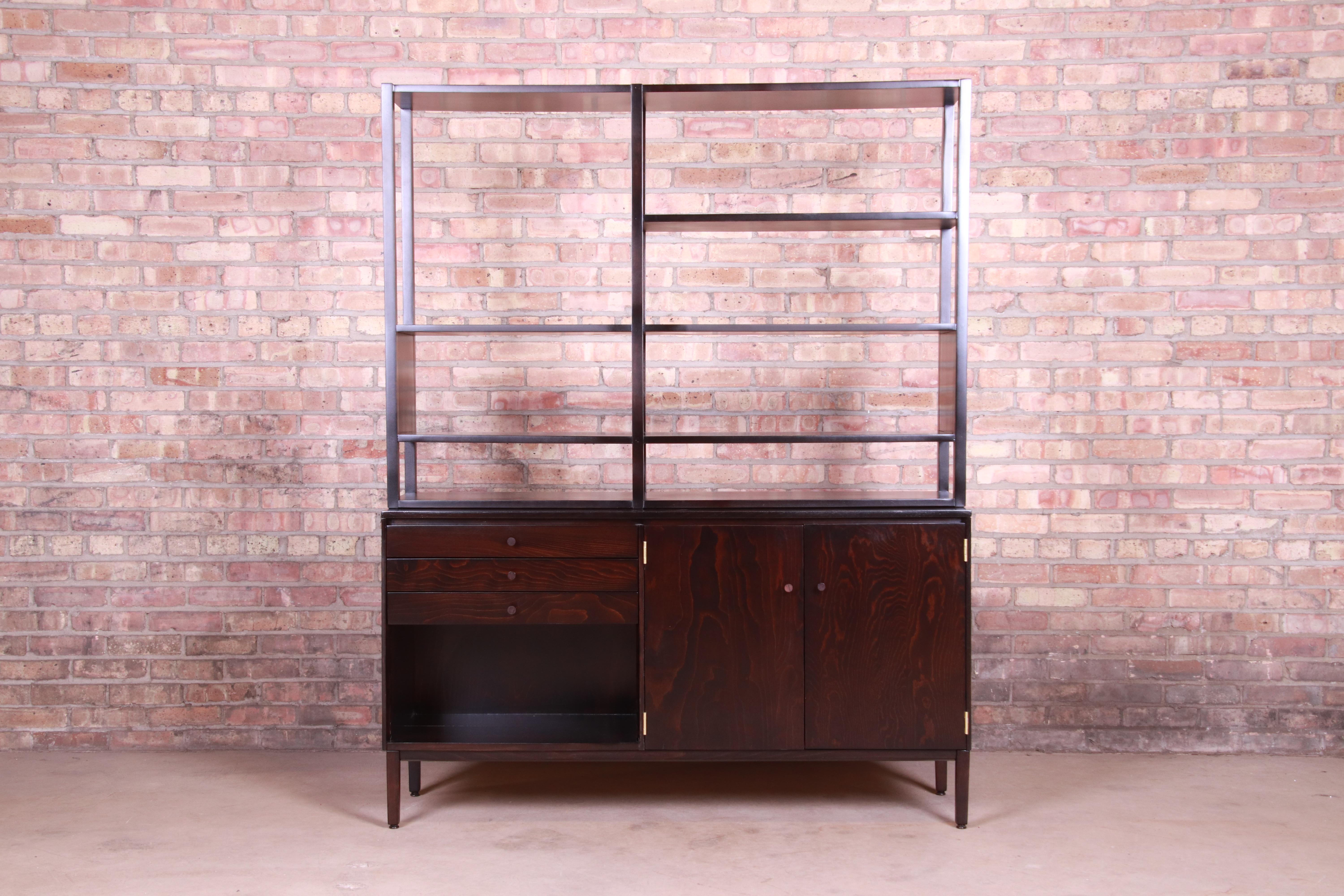 A rare and exceptional Mid-Century Modern ebonized birch double sided wall unit or room divider

By Paul McCobb for Winchendon Furniture 