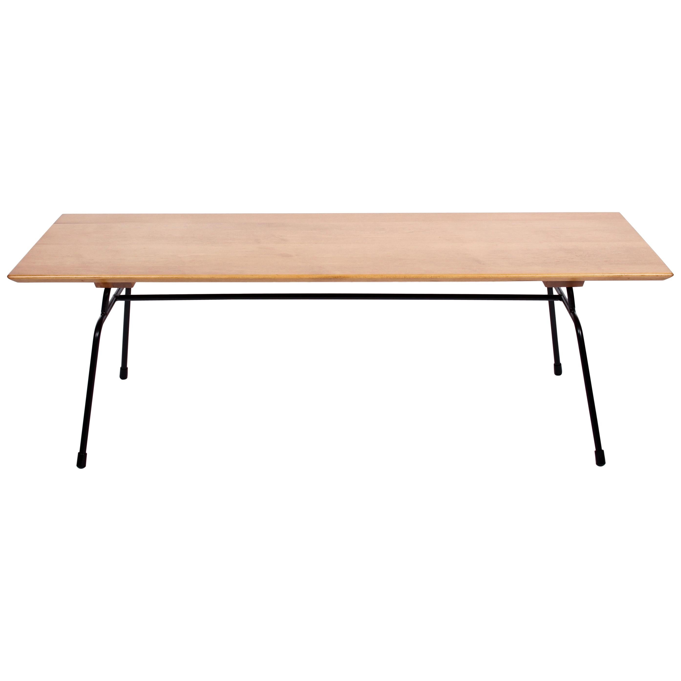 Paul McCobb Planner Group for Winchendon birch and black iron coffee table. Featuring a sturdy rectangular open Iron framework detailed with capped feet and four foot solid birch surface. Classic. Timeless. Fine design.
