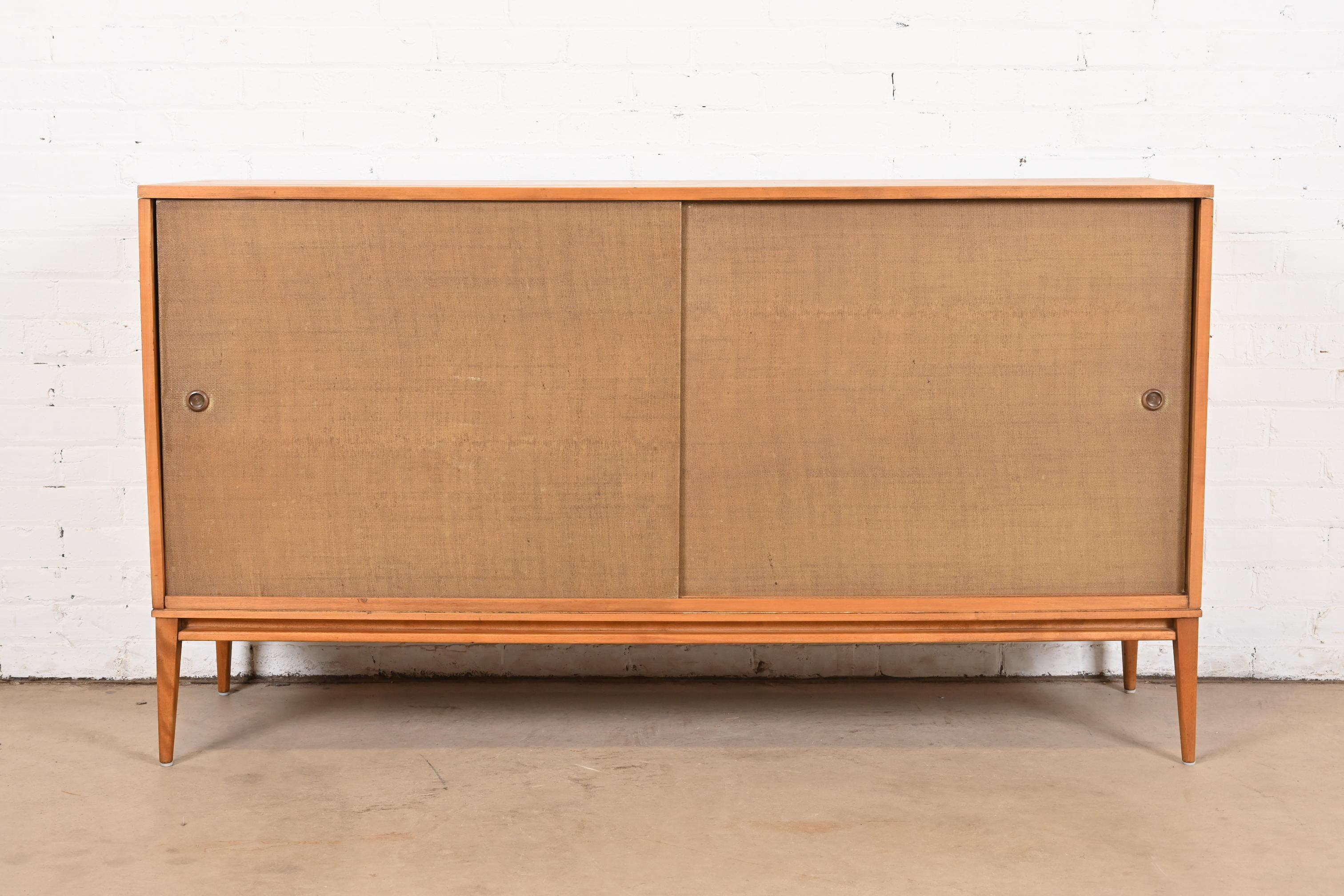 A gorgeous Mid-Century Modern sideboard, credenza, or bar cabinet

By Paul McCobb for Winchendon Furniture, 