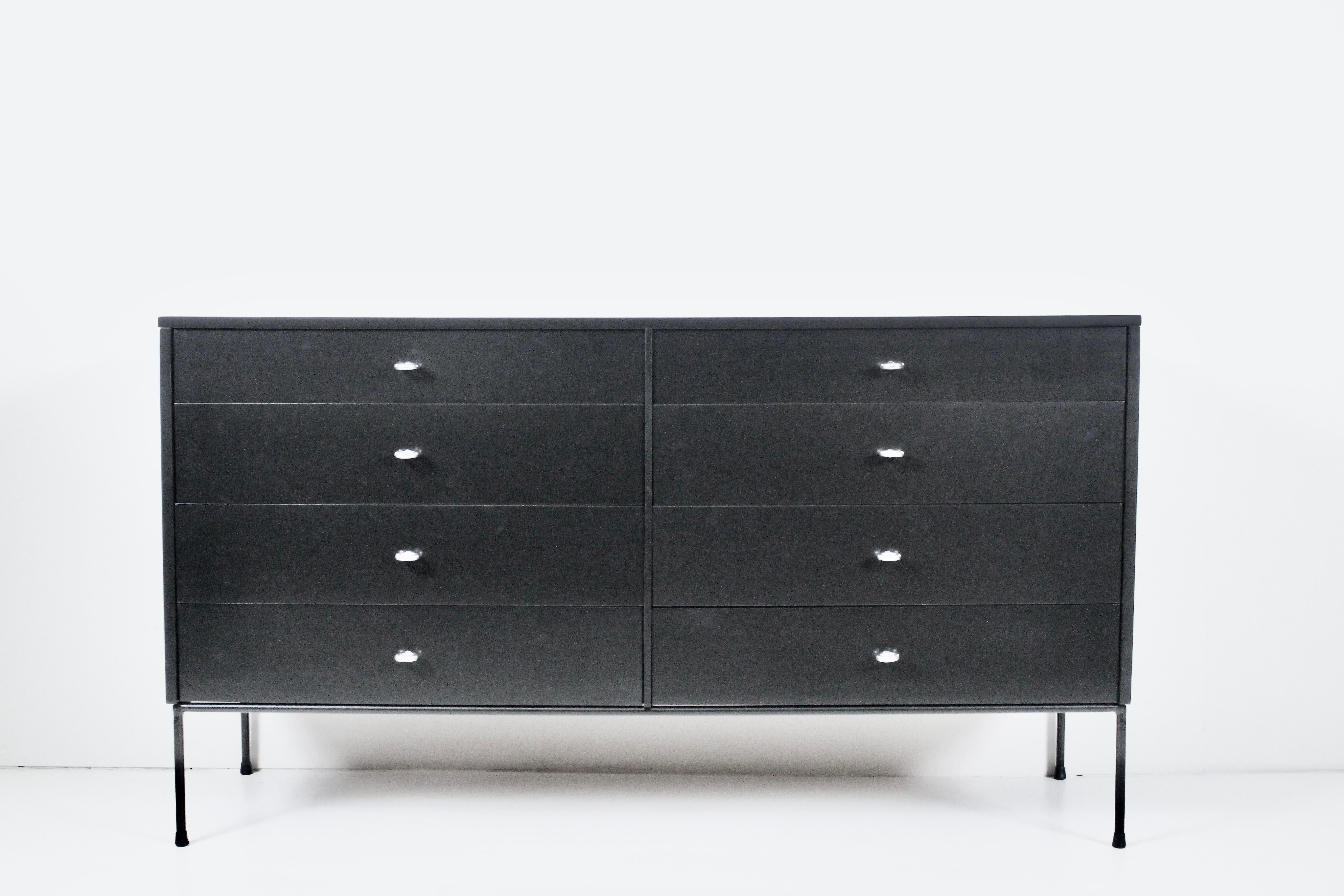 Classic Paul McCobb Planner group black eight drawer double dresser, 1950's. Featuring newly restored and re-enameled rectangular Maple form with eight clean drawers a top a four legged Black wrought iron base detailed with capped feet. With eight