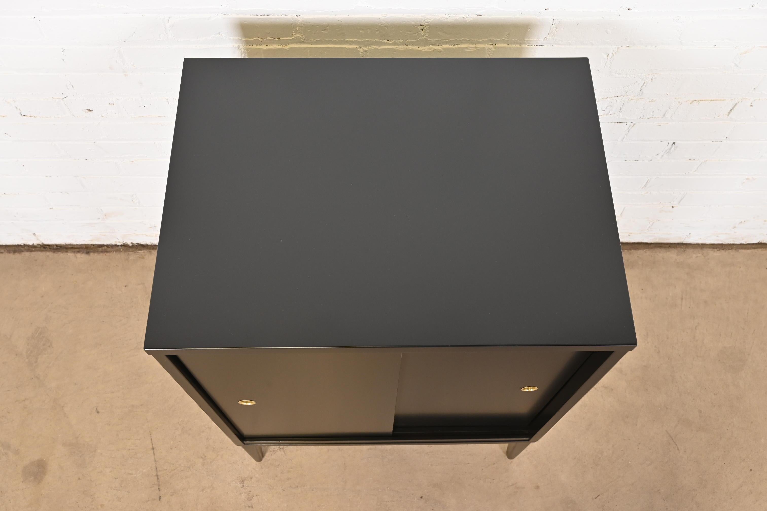 Paul McCobb Planner Group Black Lacquered Cabinet With Sliding Doors, Refinished 1