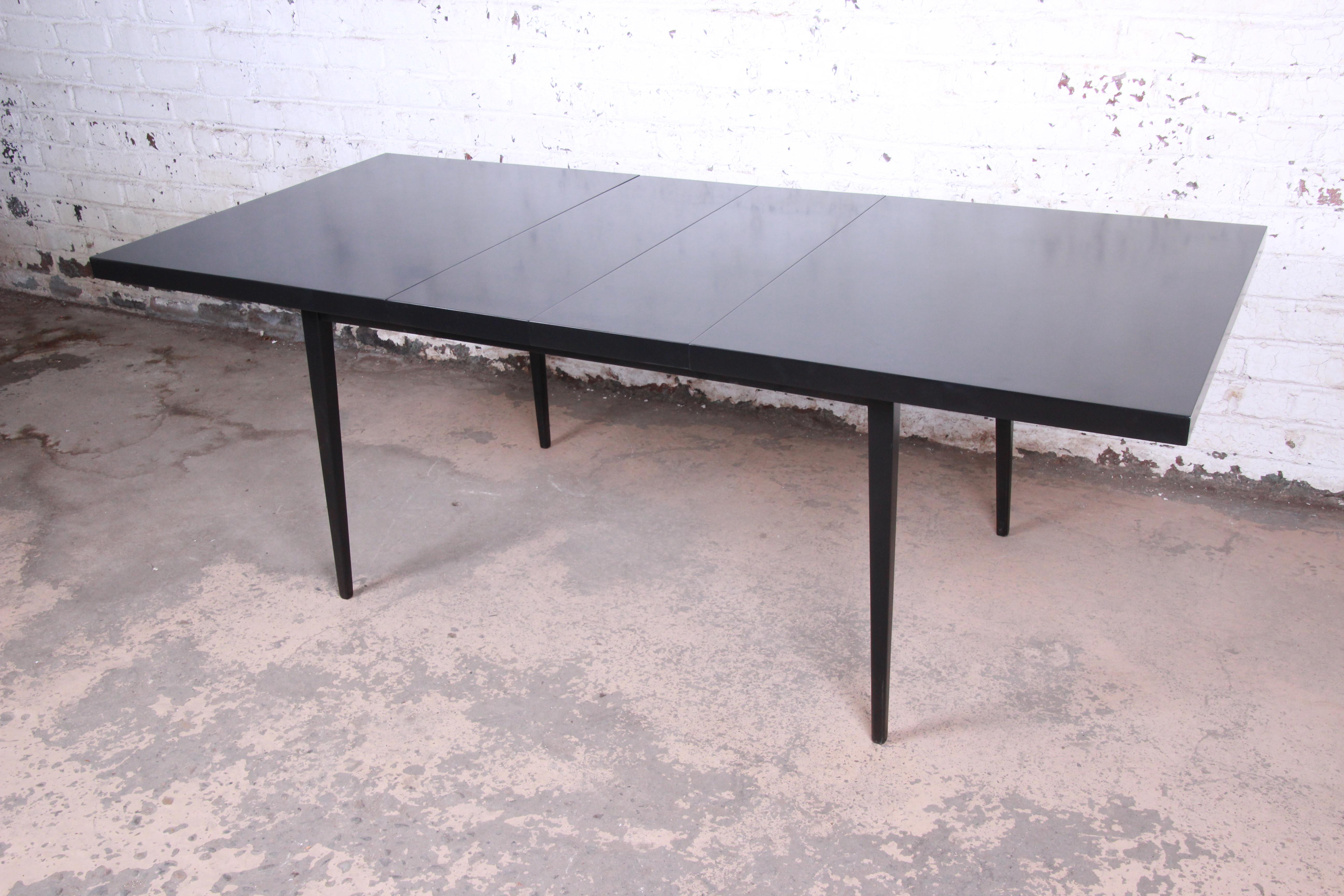 An exceptional Mid-Century Modern extension dining table

Designed by Paul McCobb for Winchendon Furniture 