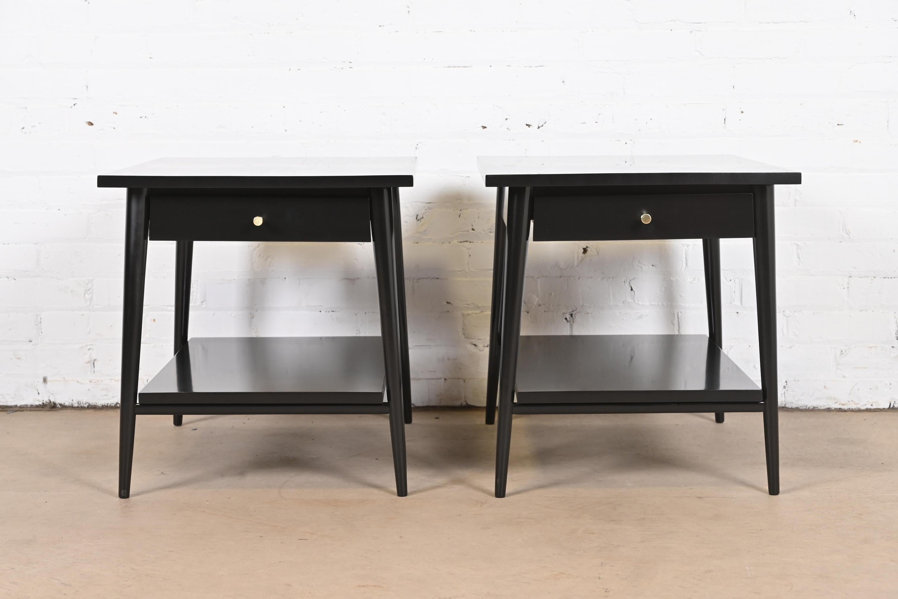 A sleek and stylish pair of Mid-Century Modern single drawer nightstands or end tables.

By Paul McCobb for Winchendon furniture, 