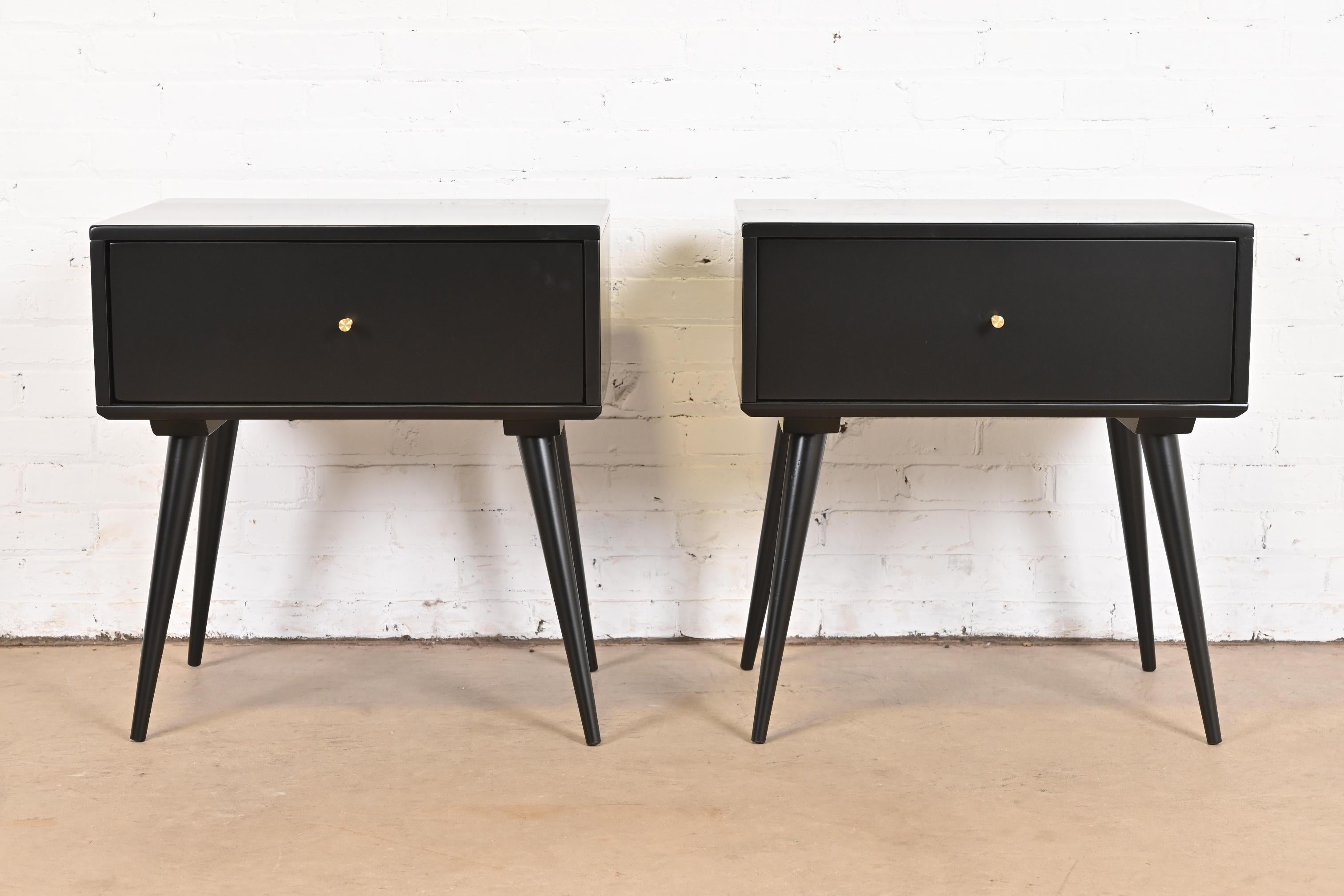 A sleek and stylish pair of Mid-Century Modern single drawer nightstands or end tables

By Paul McCobb for Winchendon Furniture, 