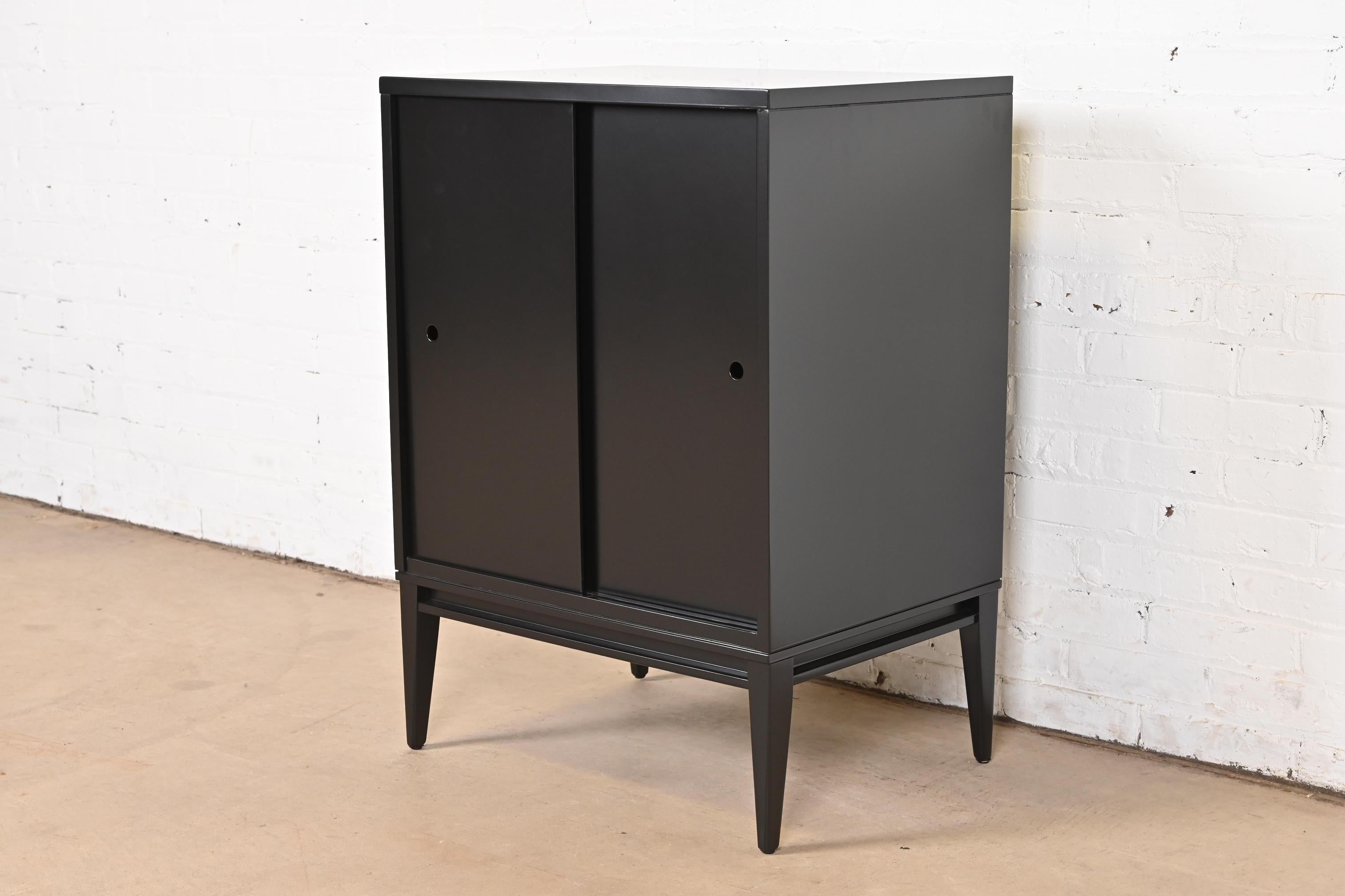 Paul McCobb Planner Group Black Lacquered Record Cabinet With Sliding Doors In Good Condition For Sale In South Bend, IN