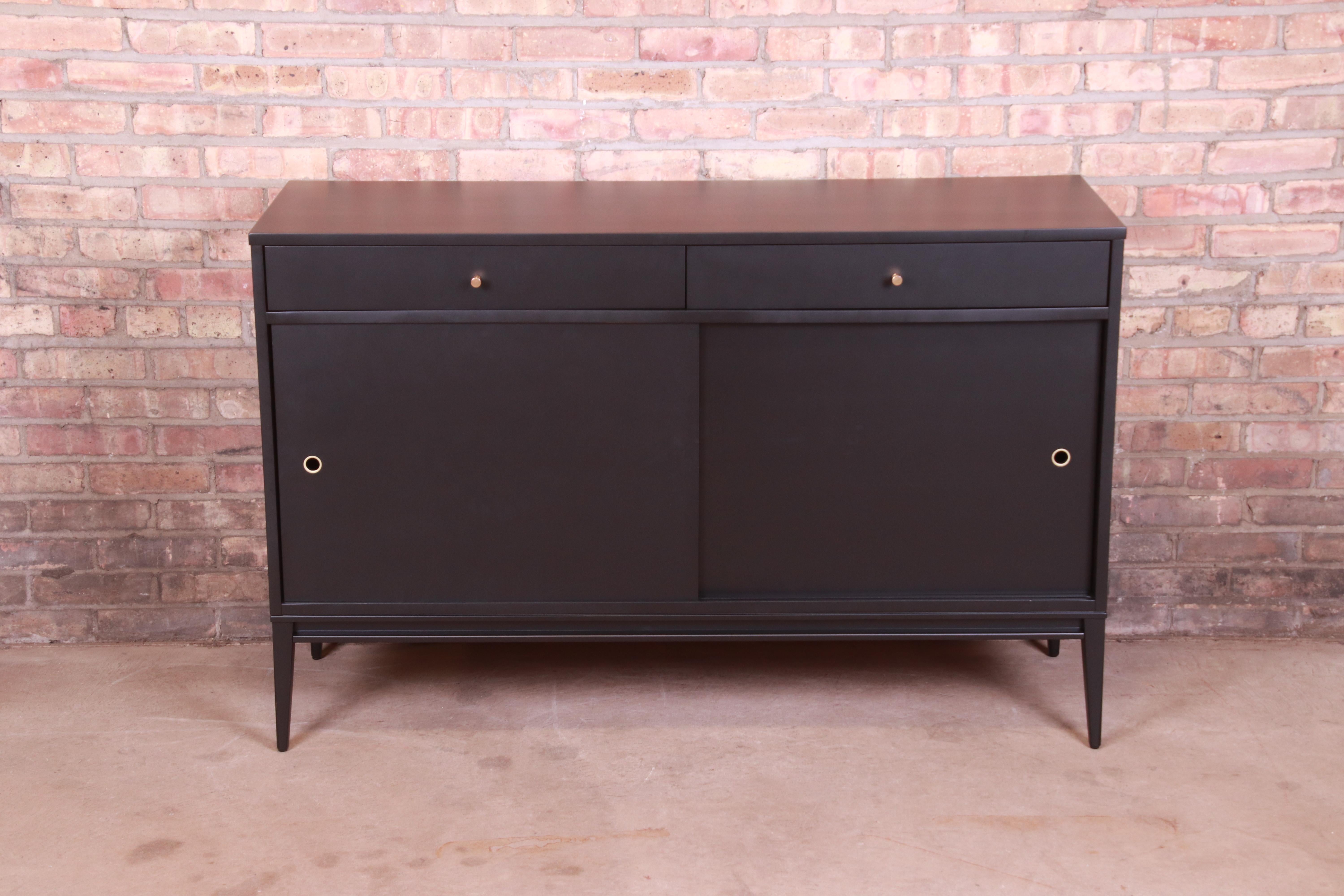 An exceptional Minimalist Mid-Century Modern sliding door sideboard, credenza, or bar cabinet

By Paul McCobb for Winchendon Furniture, 
