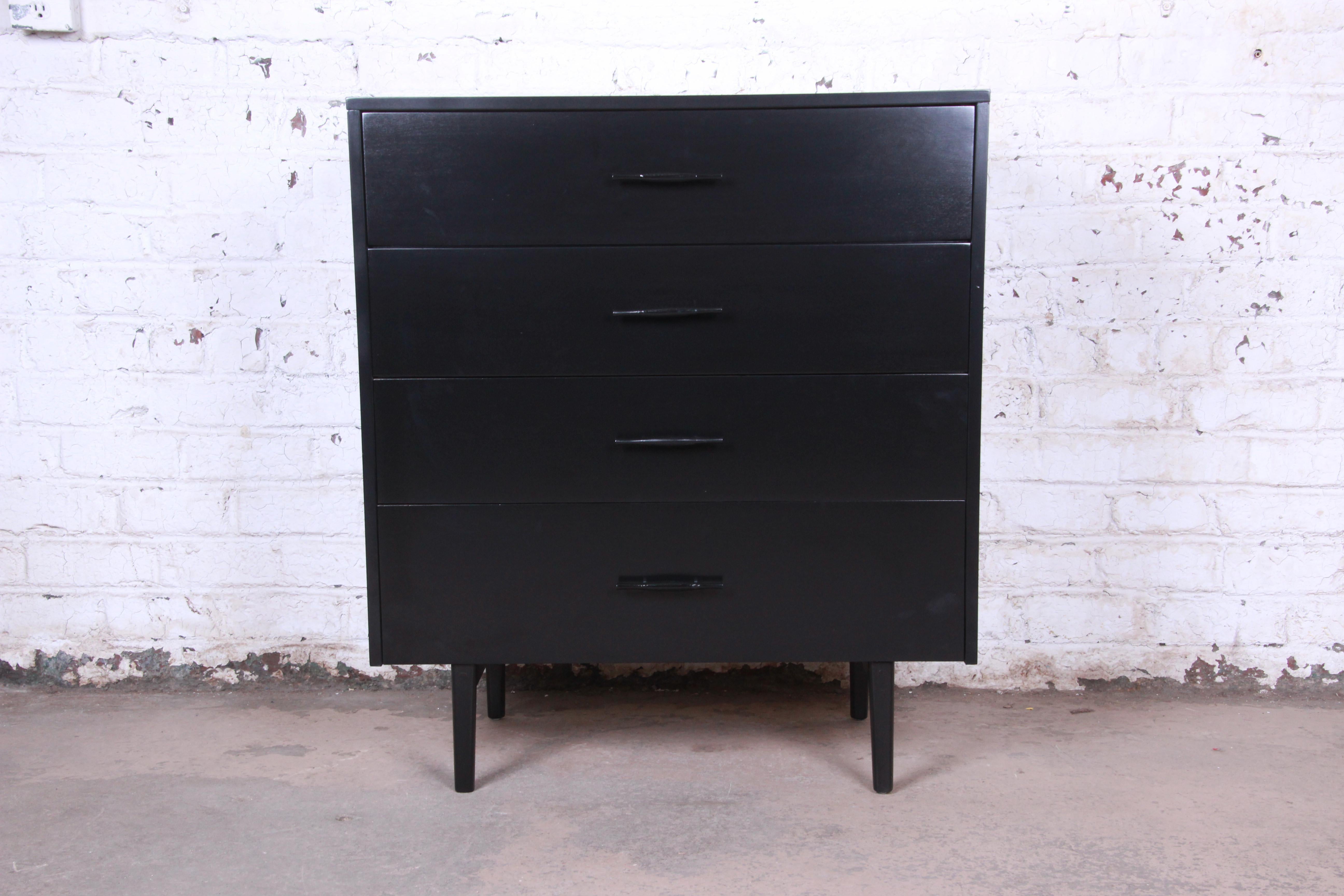 An exceptional Mid-Century Modern highboy dresser designed by Paul McCobb for his Planner Group line for Winchendon Furniture. The dresser features solid maple construction and McCobb's iconic sleek, Minimalist mid-century design. It offers good