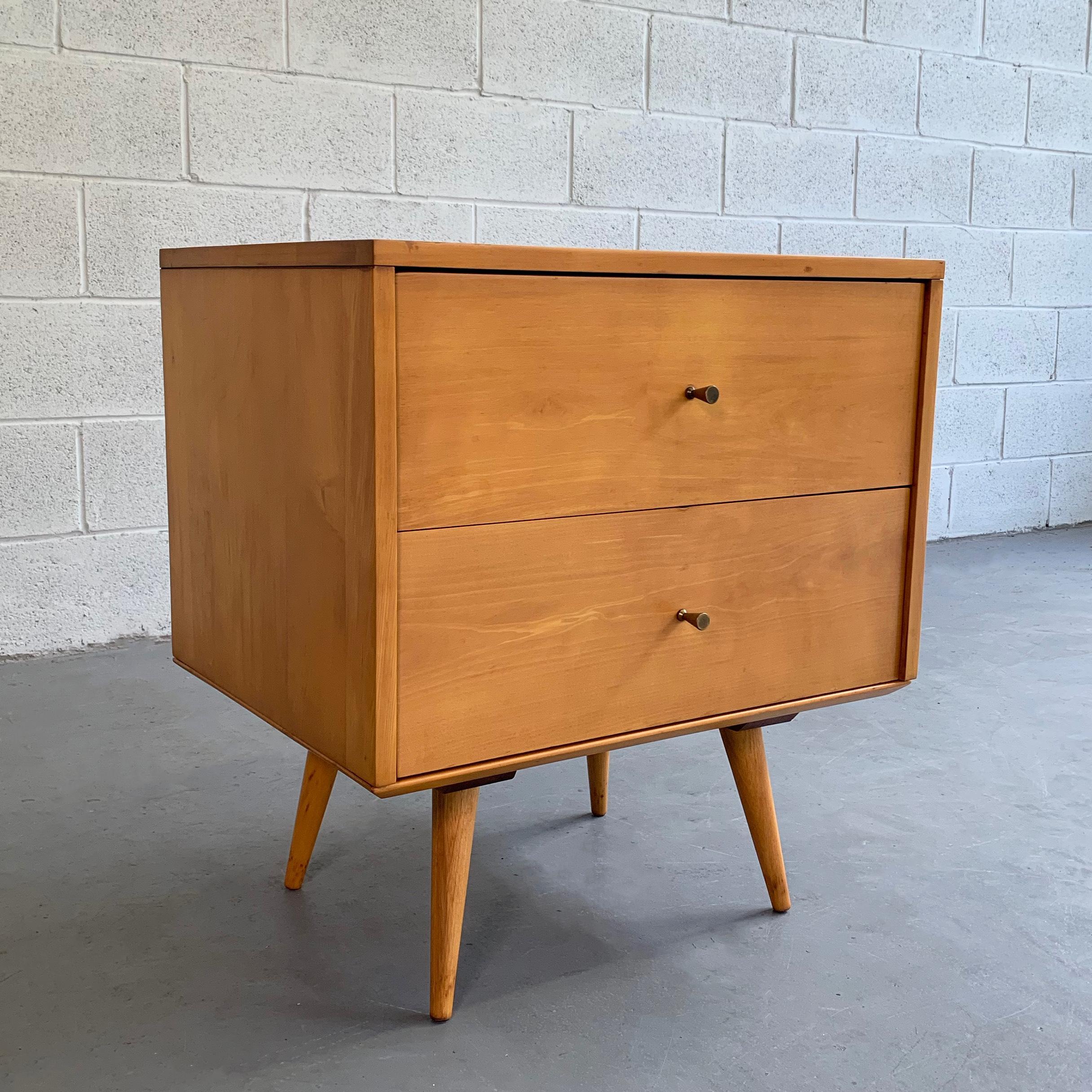 Petite, natural maple, side dresser by Paul McCobb, Planner Group for Winchendon features 2 drawers with signature McCobb brass hourglass pulls.