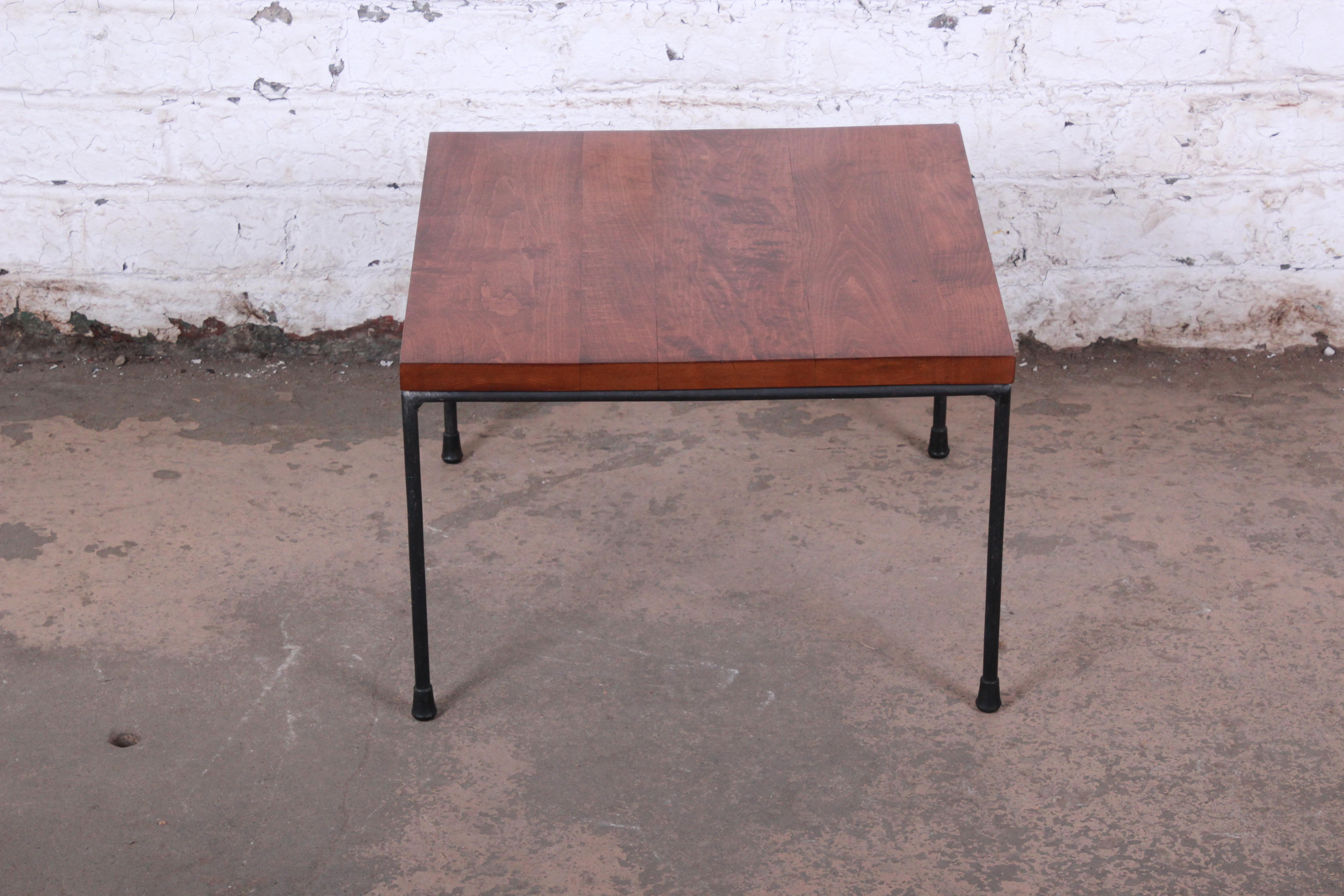 A newly refinished planner group iron base stool or side table

By Paul McCobb

USA, 1970s

Maple and iron

Measures: 20