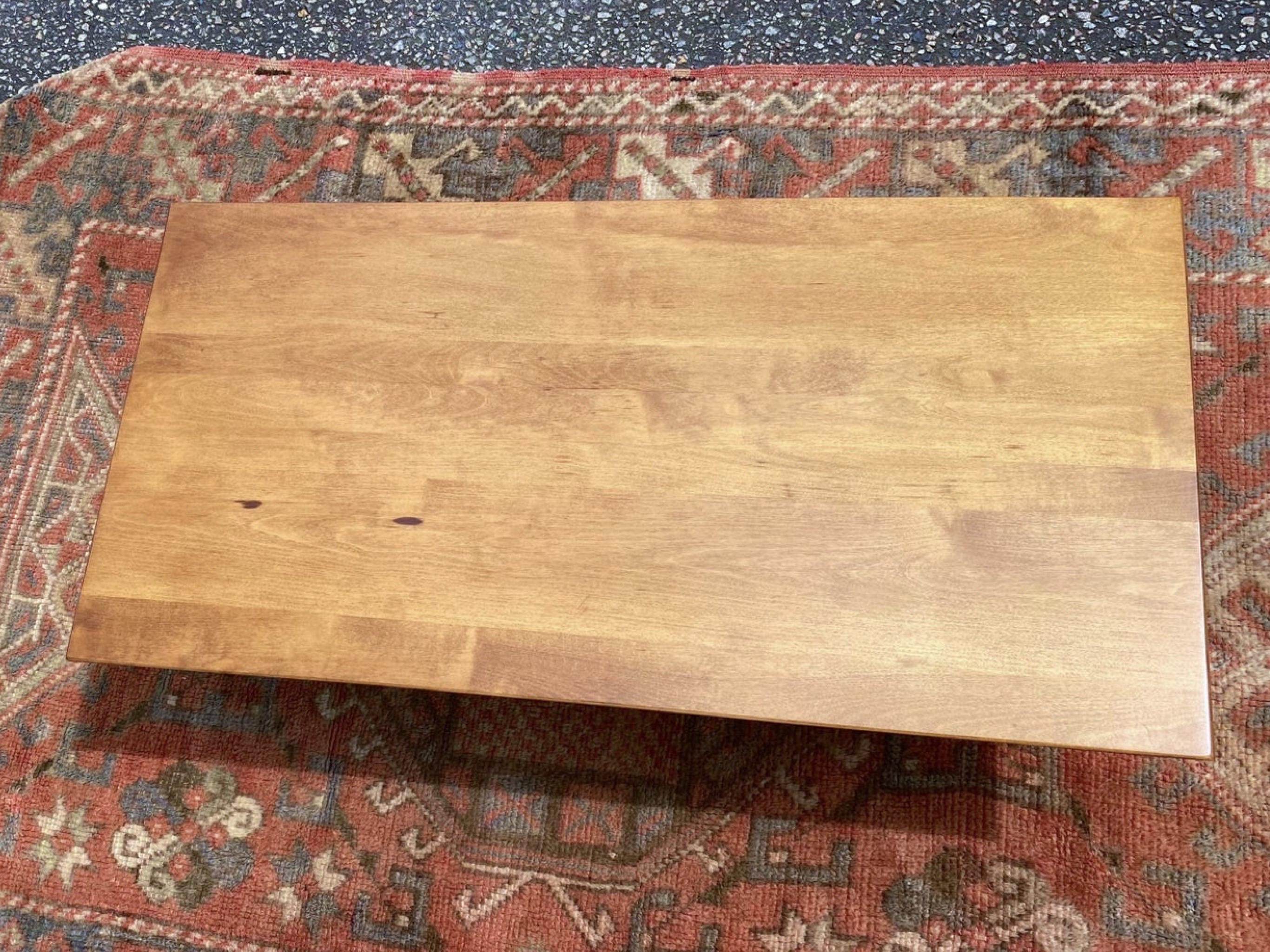 This is not a table that you come across often, the very low Paul McCobb coffee table. It is low enough that it works like a display table and is sometimes paired with a cabinet Or I have seen it paired with the higher coffee table where it nestled