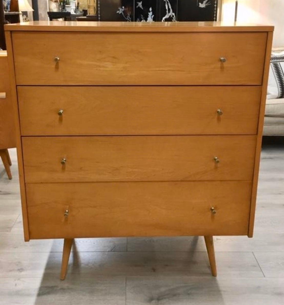 Iconic Paul McCobb Planner Group beauty. The four drawer dresser is all original and sports the famed peg legs and original drawer pulls. The wood is maple and the scale and lines are second to none.
