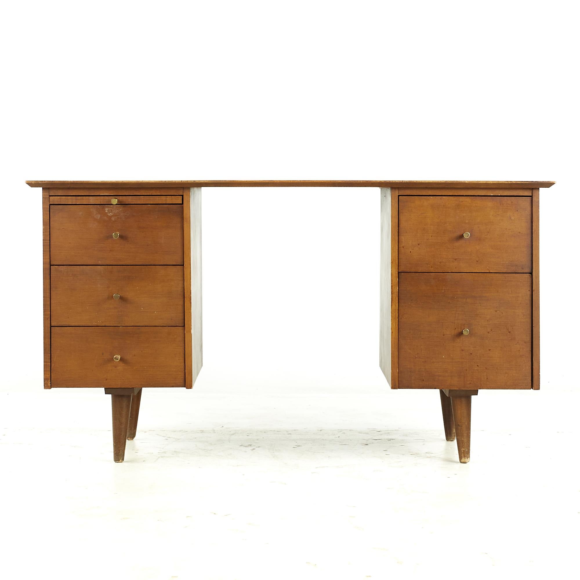 Paul McCobb Planner Group midcentury Double Pedestal Desk

This desk measures: 53 wide x 26 deep x 28.75 high

All pieces of furniture can be had in what we call restored vintage condition. That means the piece is restored upon purchase so it’s