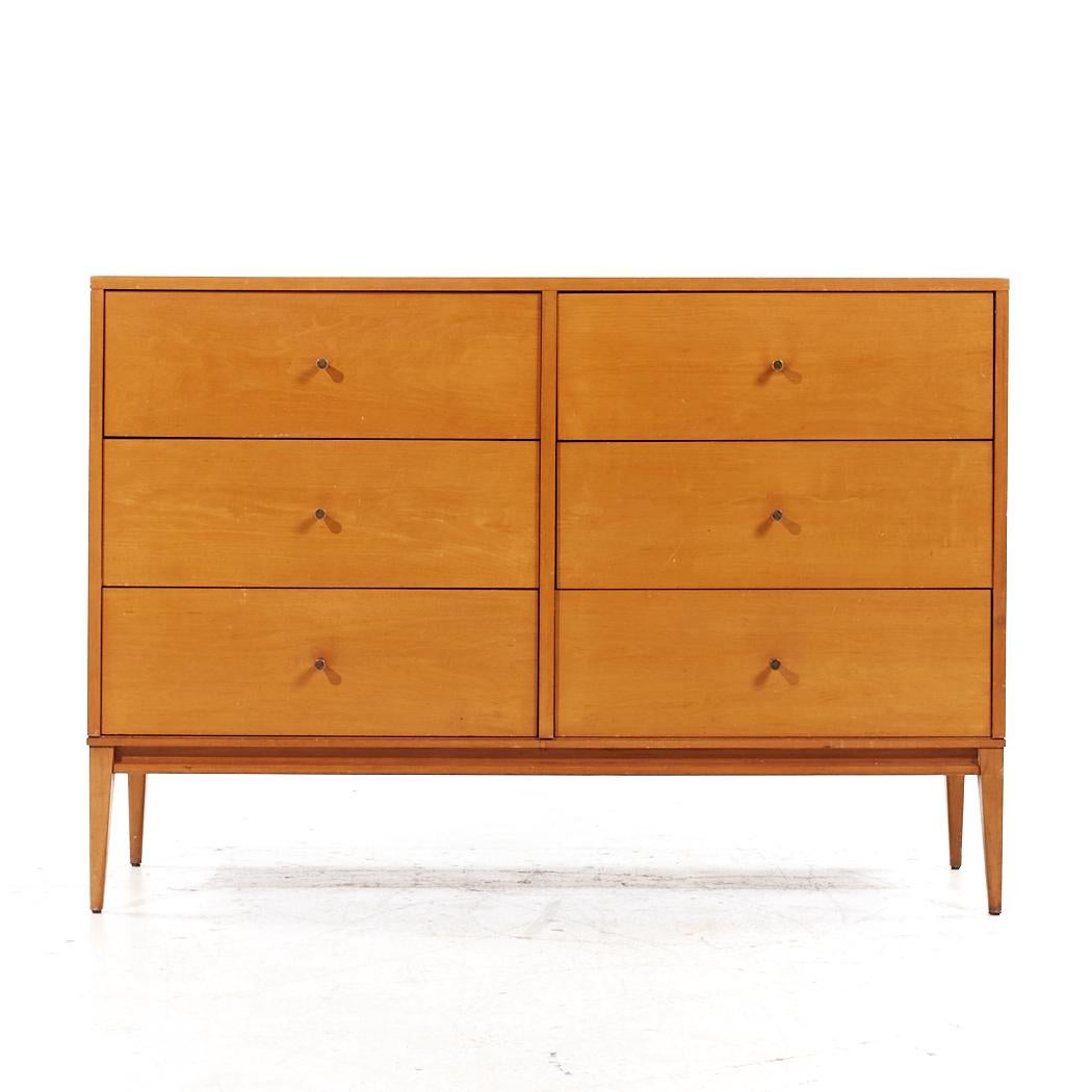 Paul McCobb Planner Group Mid Century Lowboy Dresser

This lowboy measures: 48 wide x 18 deep x 33.5 inches high

All pieces of furniture can be had in what we call restored vintage condition. That means the piece is restored upon purchase so it’s