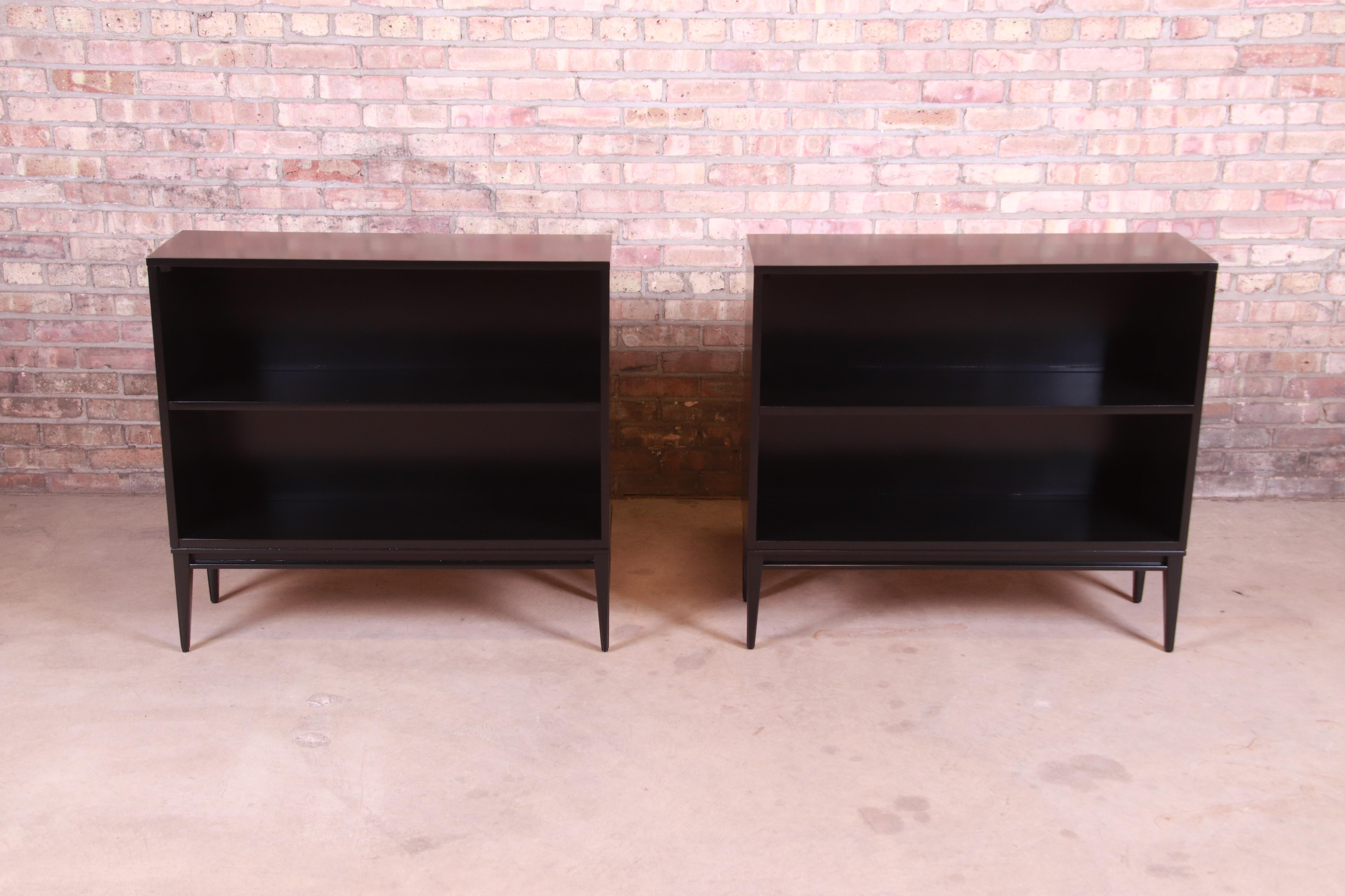 An exceptional pair of Mid-Century Modern black lacquered solid birch bookcases

By Paul McCobb for Winchendon Furniture 