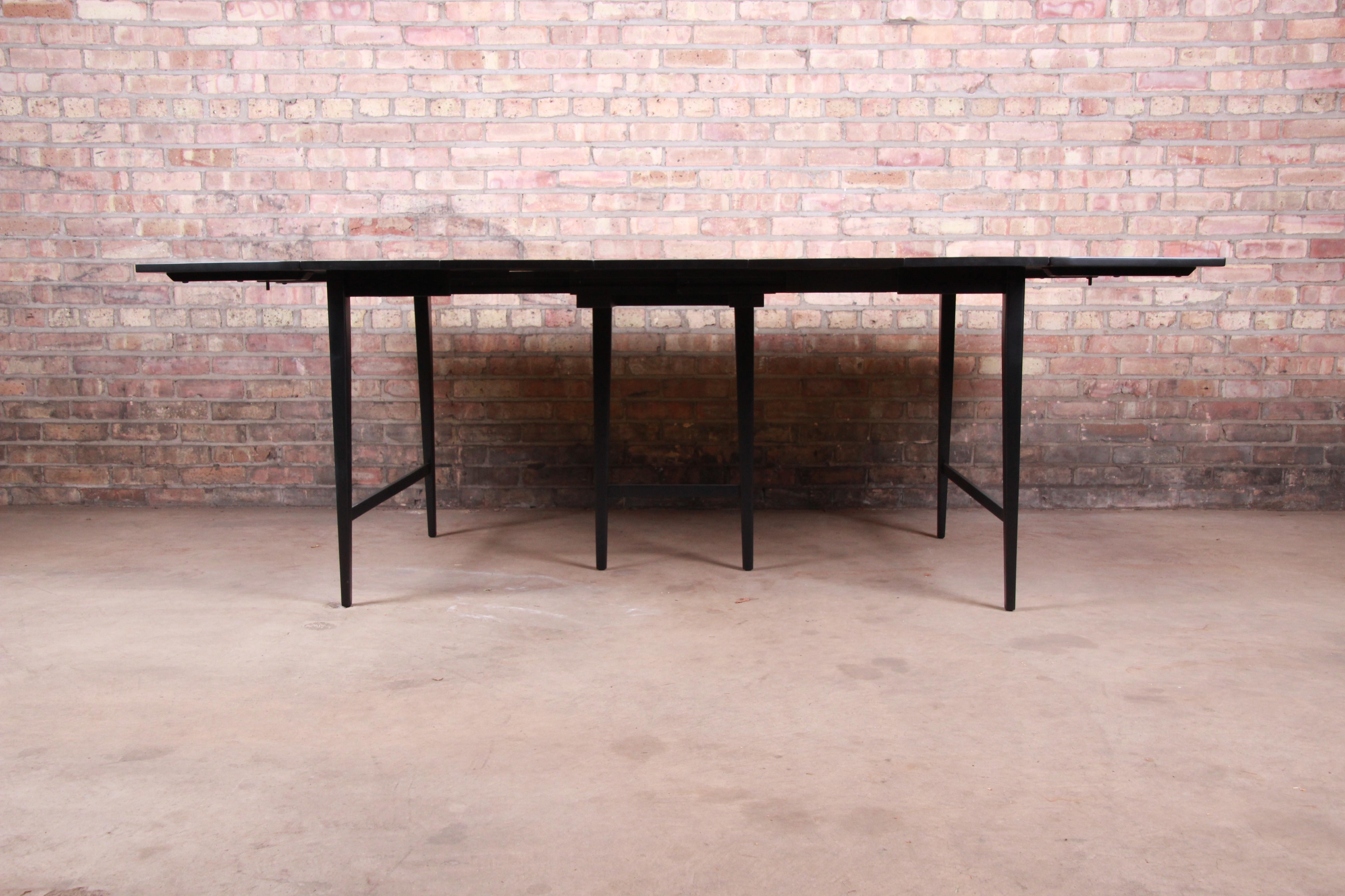 Paul McCobb Planner Group Mid-Century Modern Black Lacquered Dining Table, 1950s In Good Condition For Sale In South Bend, IN