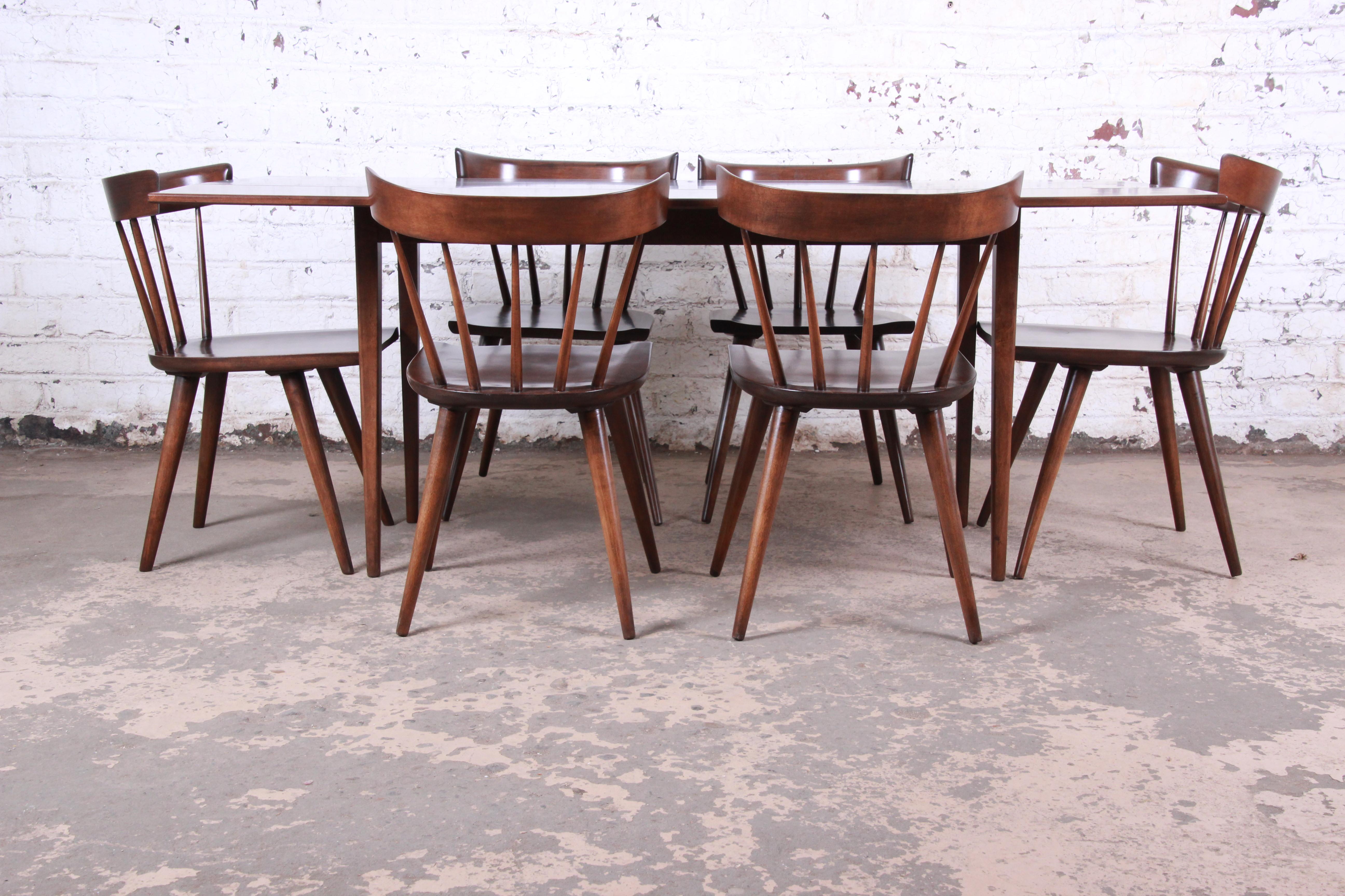 A rare and exceptional Mid-Century Modern seven-piece dining set including drop-leaf harvest table and six spindle back dining chairs

Designed by Paul McCobb for his Planner Group line for Winchendon Furniture

USA, 1950s

Solid birch