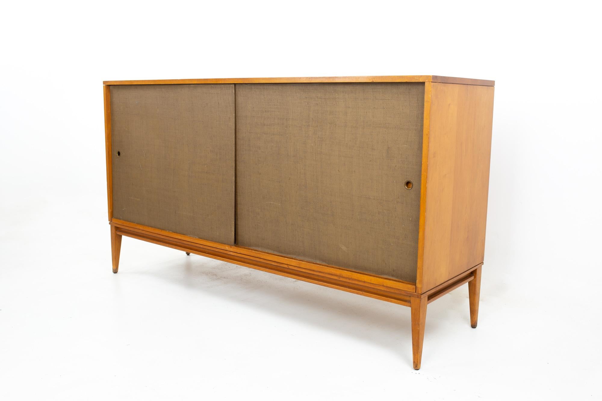 Paul McCobb Planner Group mid century sliding door credenza
Credenza measures: 60 wide x 18 deep x 26 inches high

All pieces of furniture can be had in what we call restored vintage condition. That means the piece is restored upon purchase so