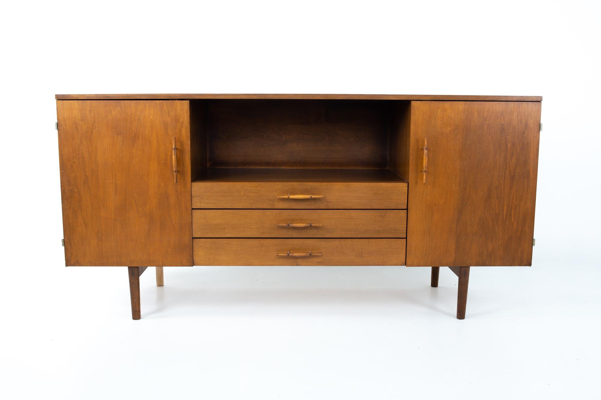 Paul McCobb Planner Group midcentury sideboard credenza
Credenza measures: 66 wide x 18 deep x 32 inches high

This price includes getting this piece in what we call restored vintage condition. That means the piece is permanently fixed upon